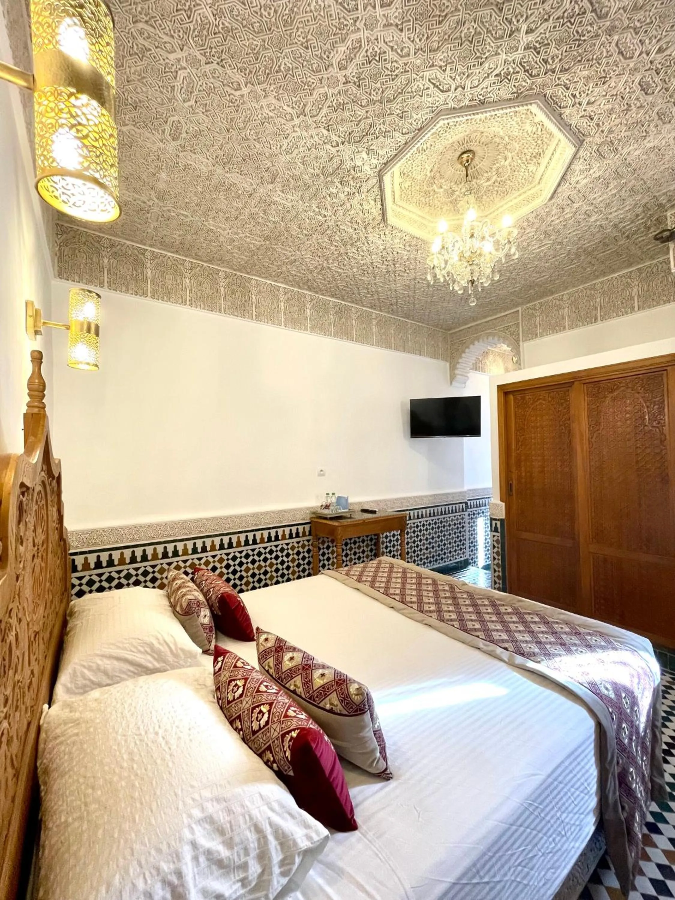 Bed in Le Grand Alcazar - Riad