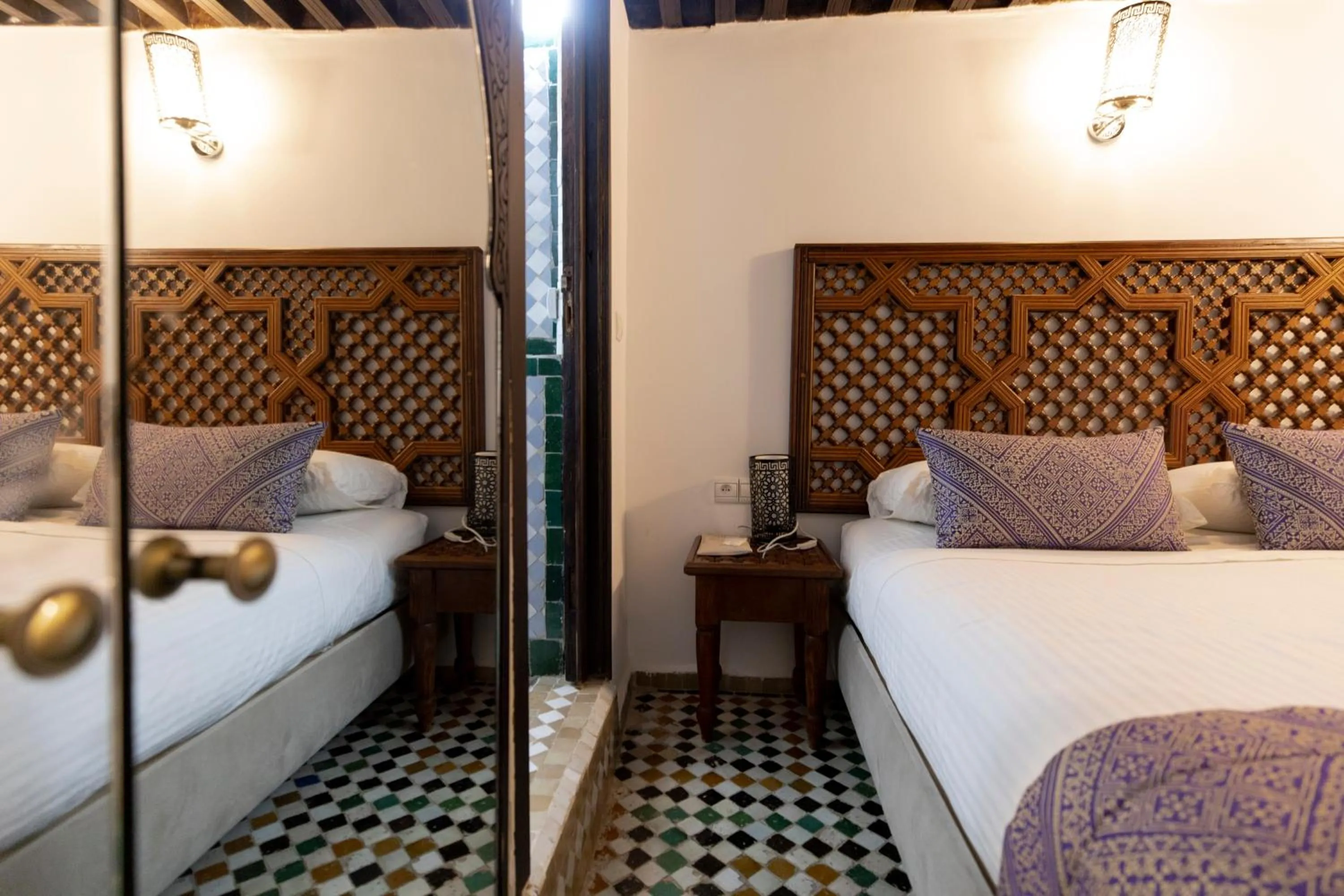 Bed in Le Grand Alcazar - Riad