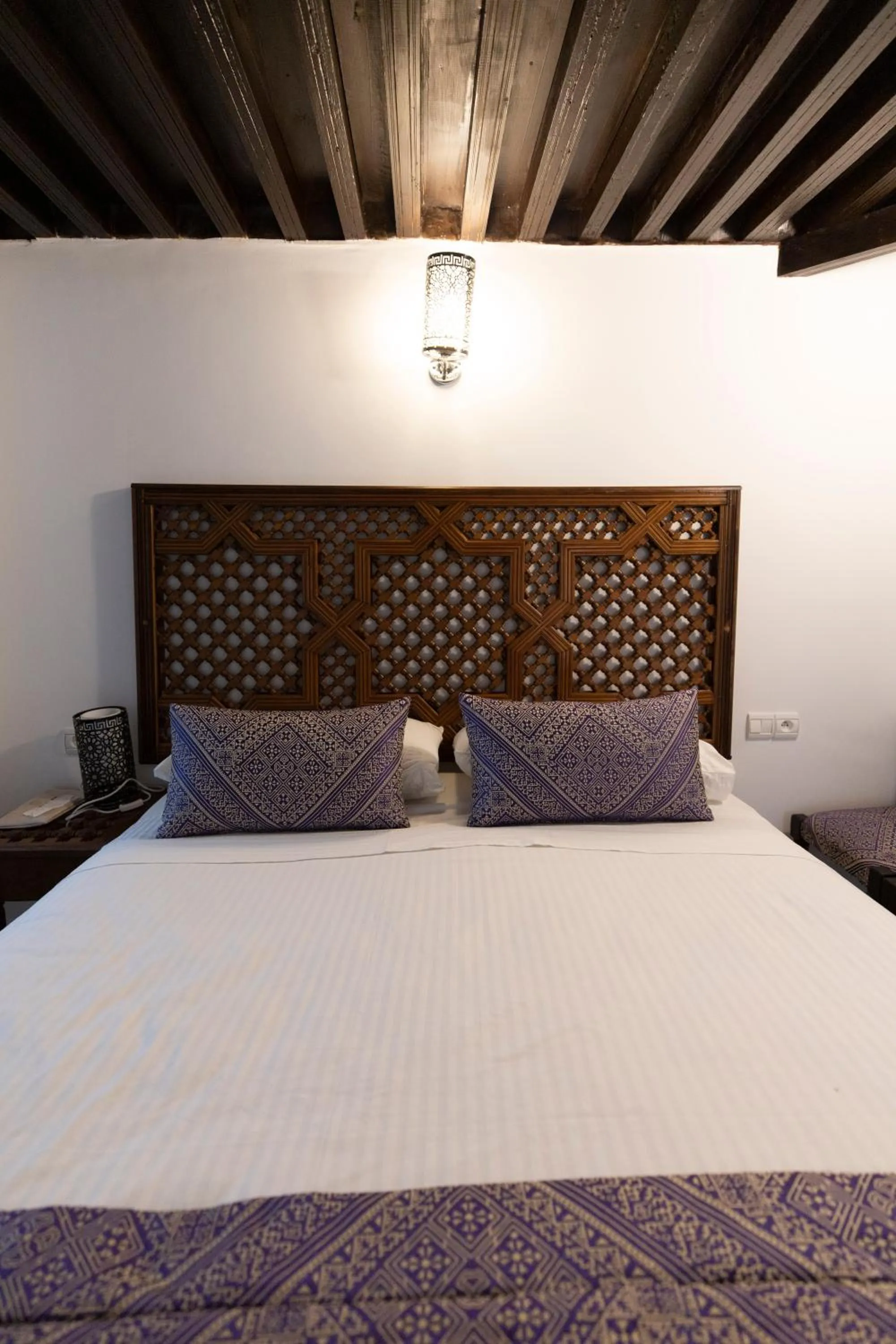 Bed in Le Grand Alcazar - Riad
