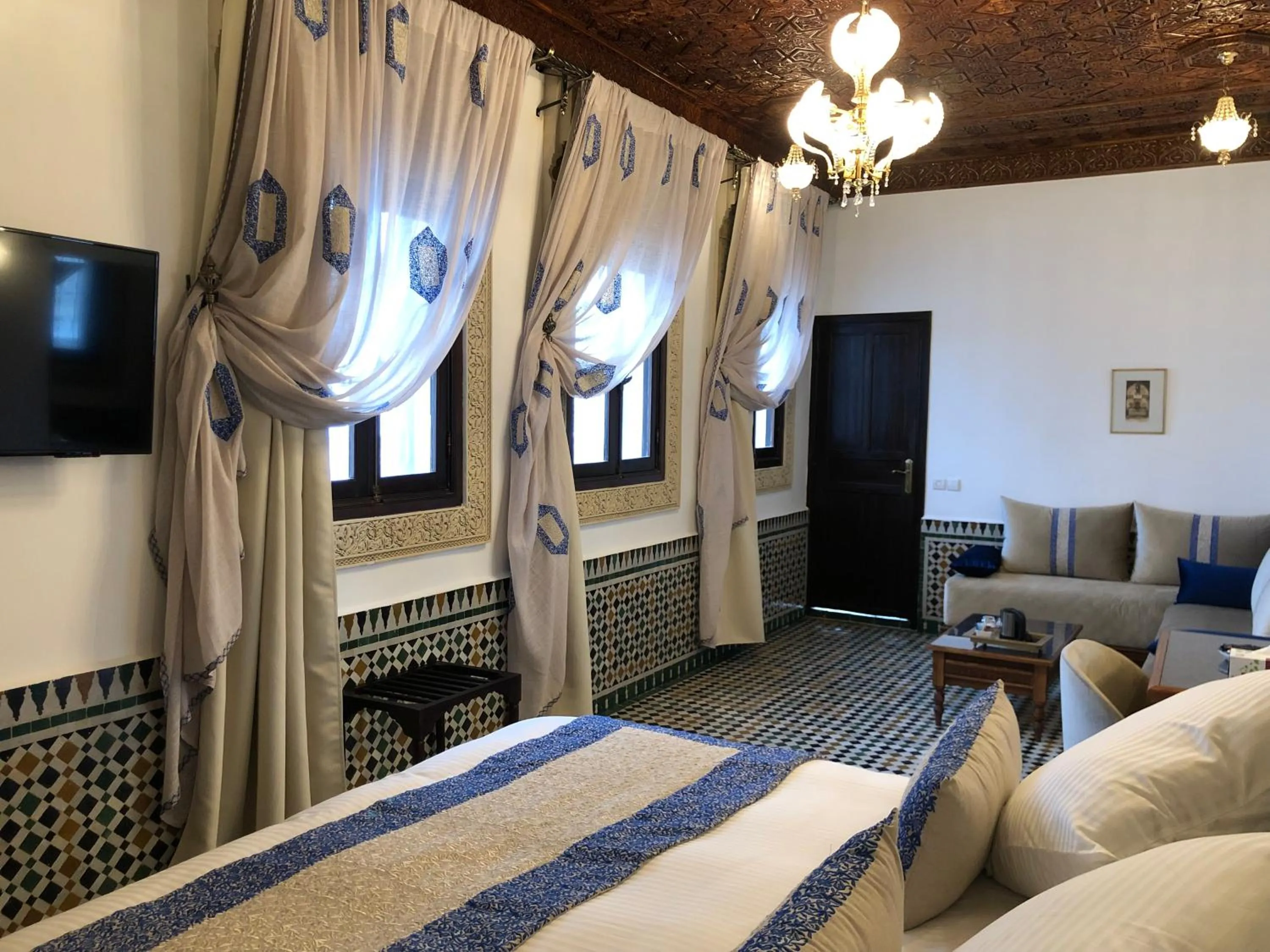 Bed in Le Grand Alcazar - Riad