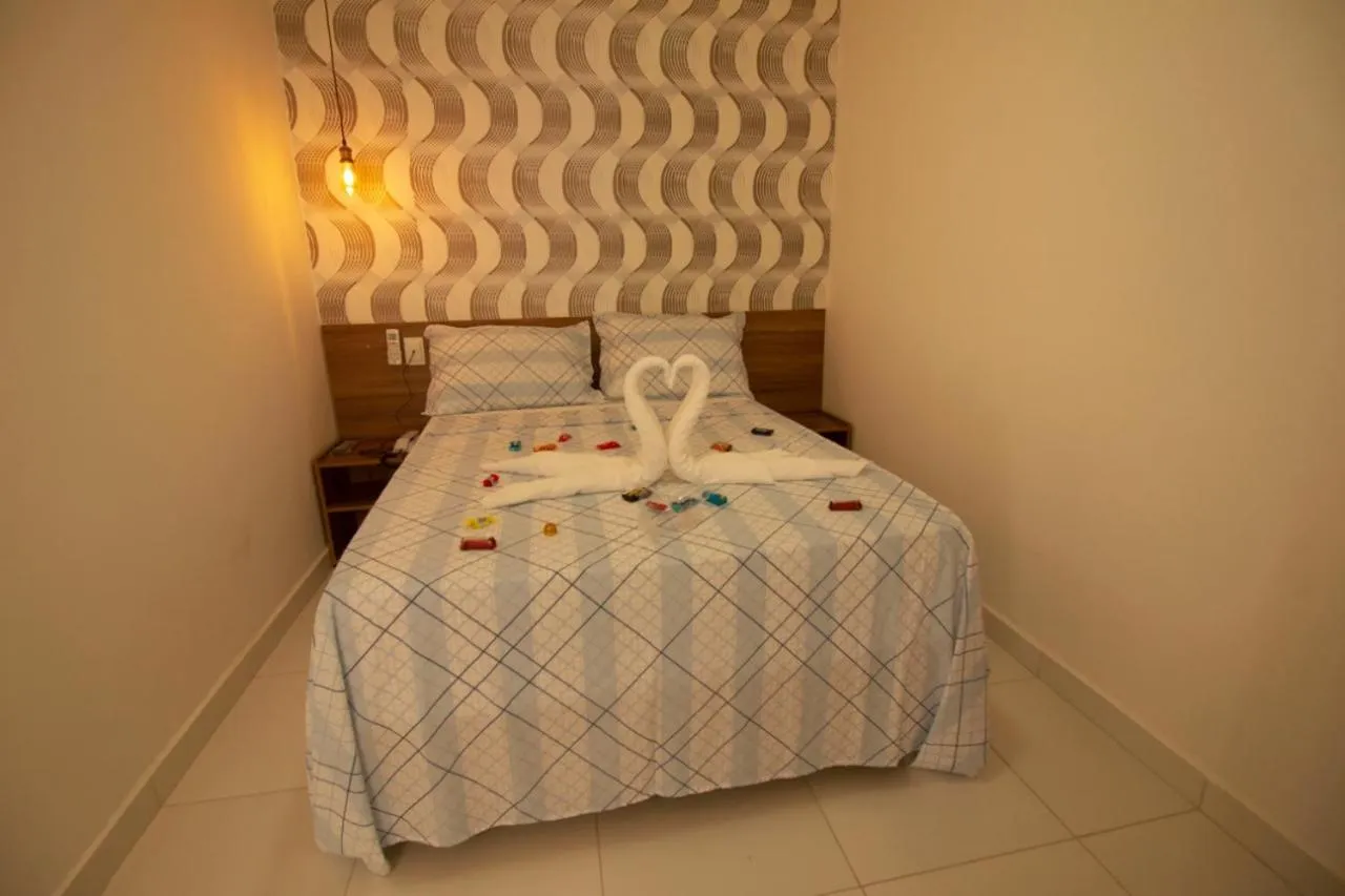 Bed in Pousada Aliança