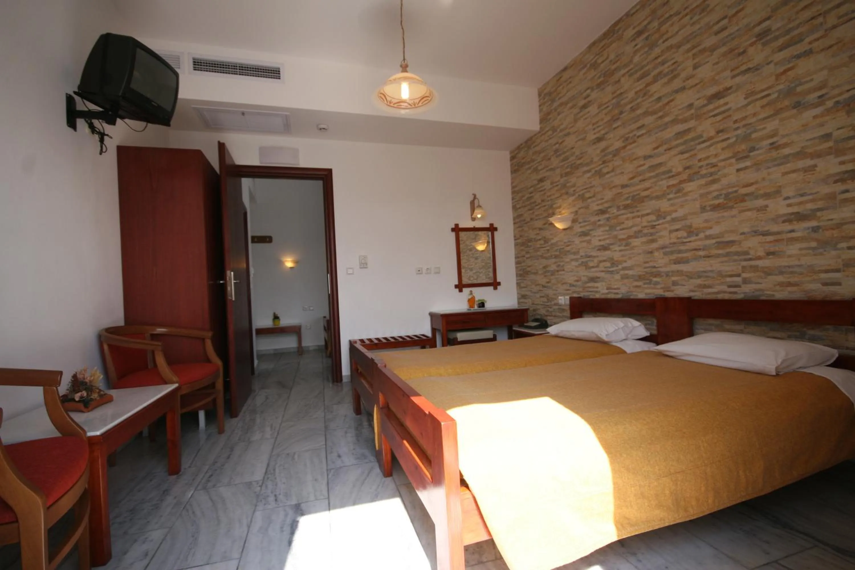 Photo of the whole room, Bed in Iliovasilema