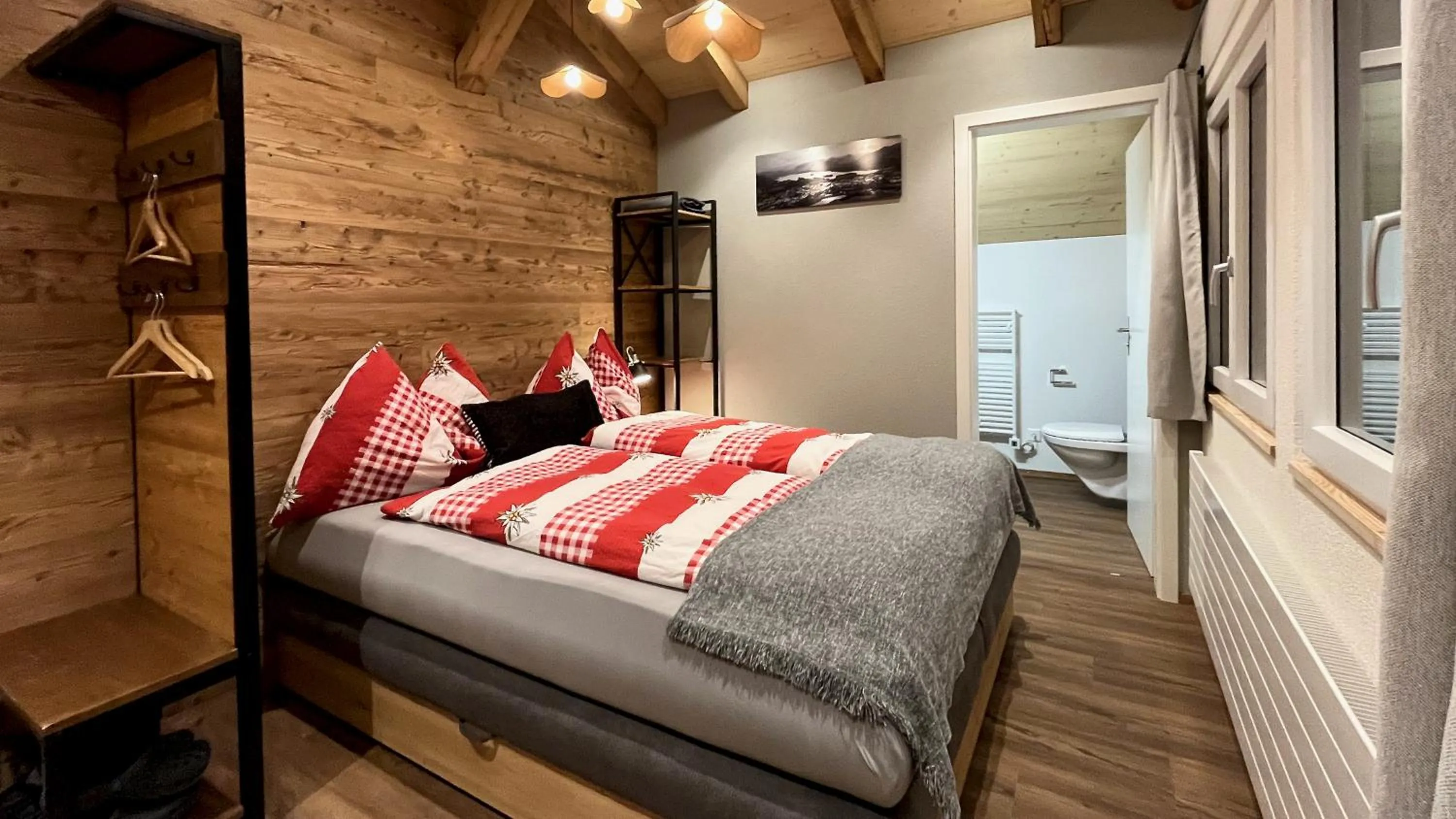 Bedroom, Bed in Berggasthaus Eggberge - Boutique Mountain Hotel - Access via Cablecar