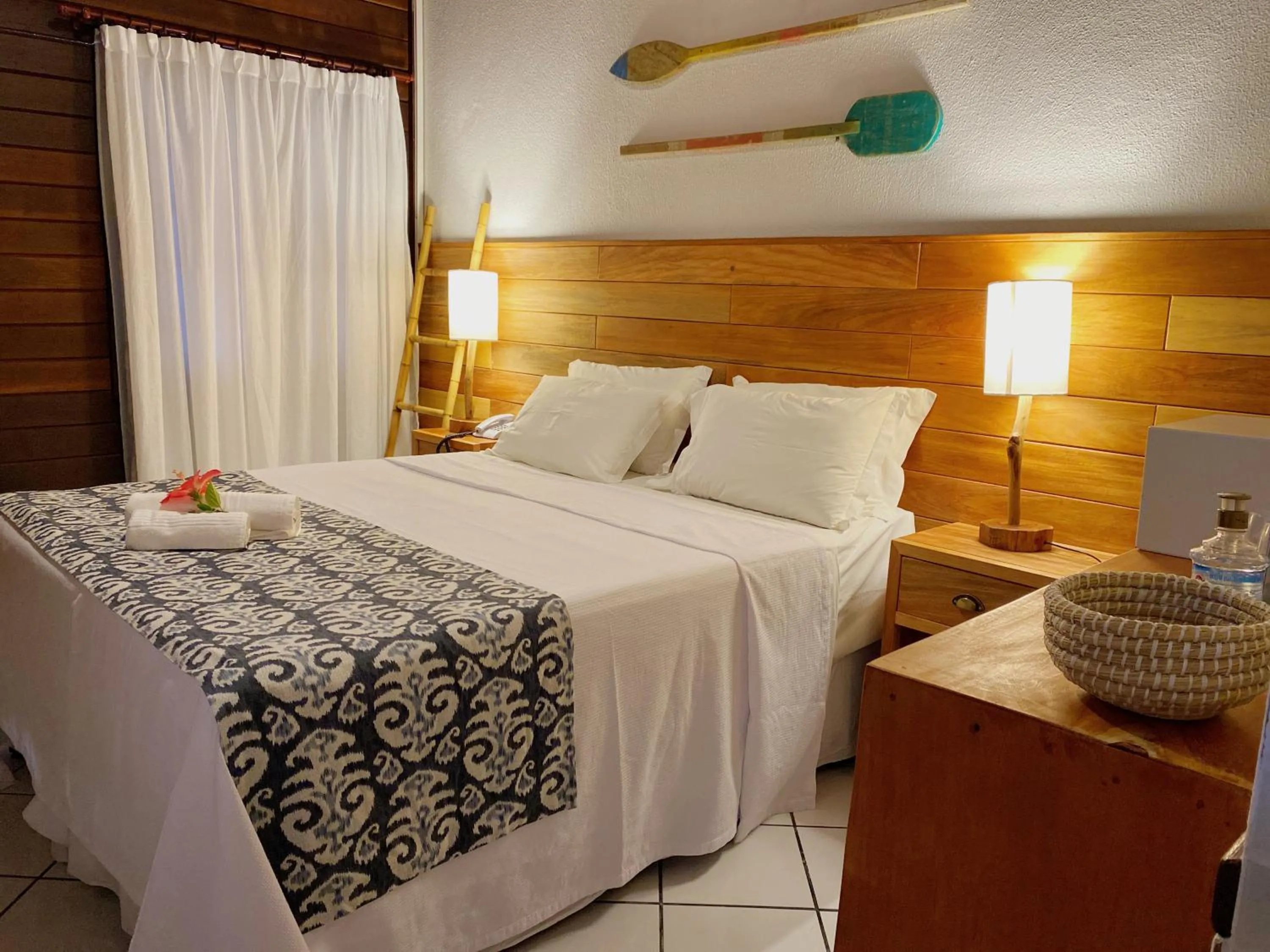 Photo of the whole room, Bed in Pousada Estrela do Mar Noronha by Alto da Ilha
