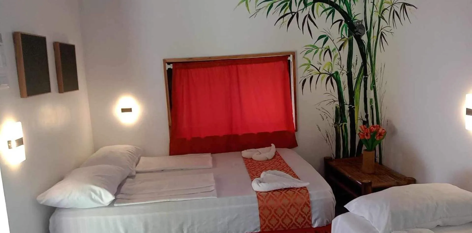 Bed in Cuestas Beach Resort and Restaurant