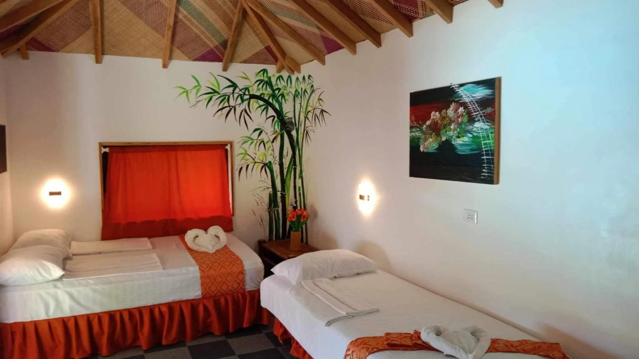 Bed in Cuestas Beach Resort and Restaurant