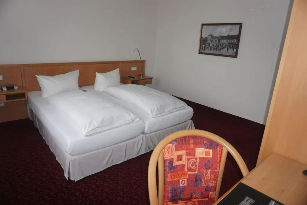 Bed in Hotel Am Schloss Aurich