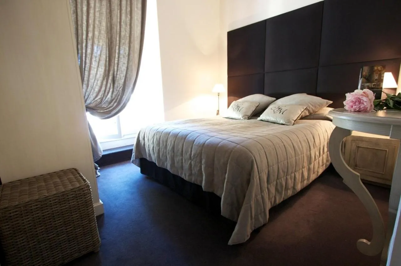 Bedroom in Hotel De Monaco