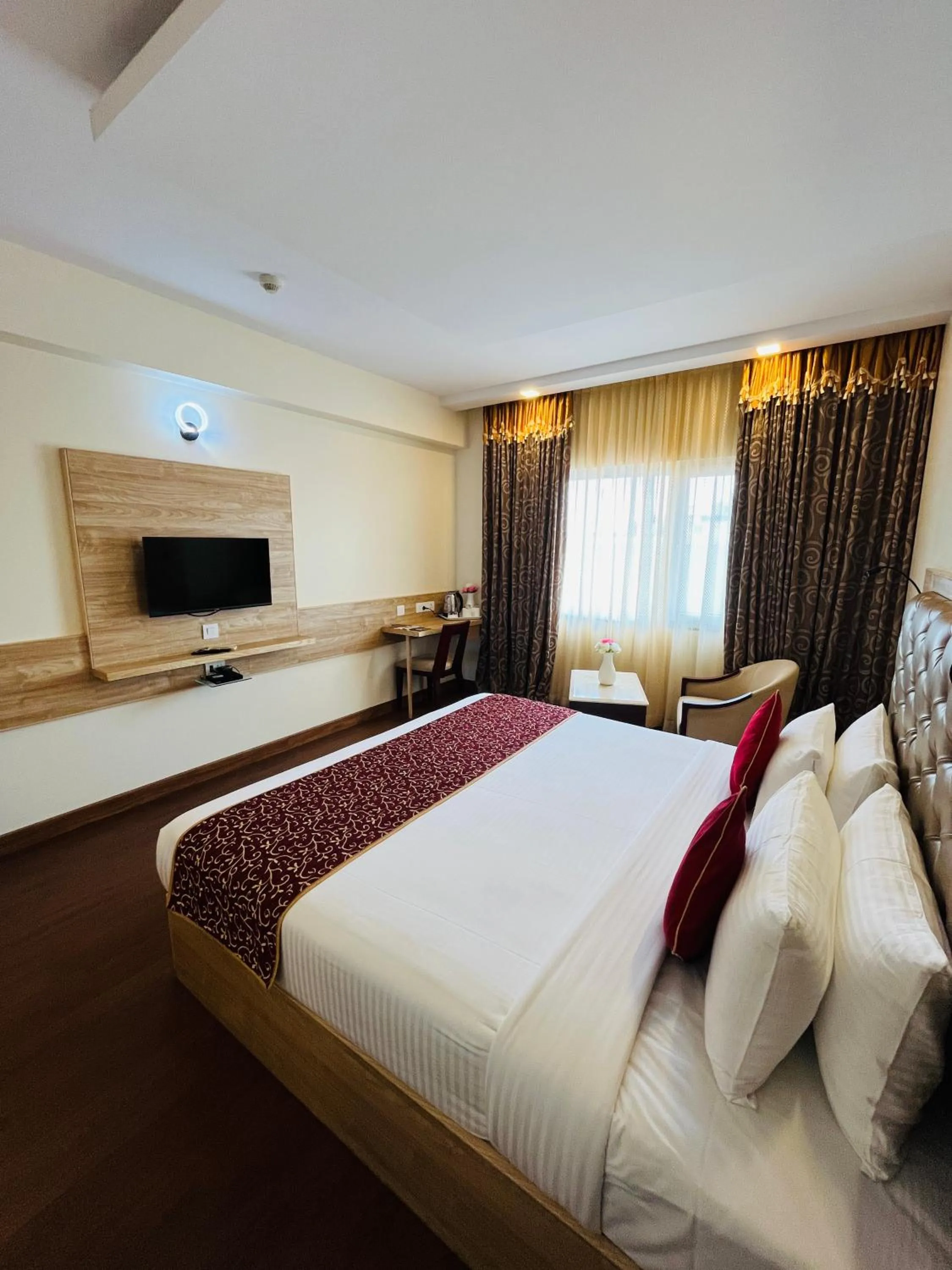 Bedroom in Hotel Abhimaani Vasathi, Rajajinagar