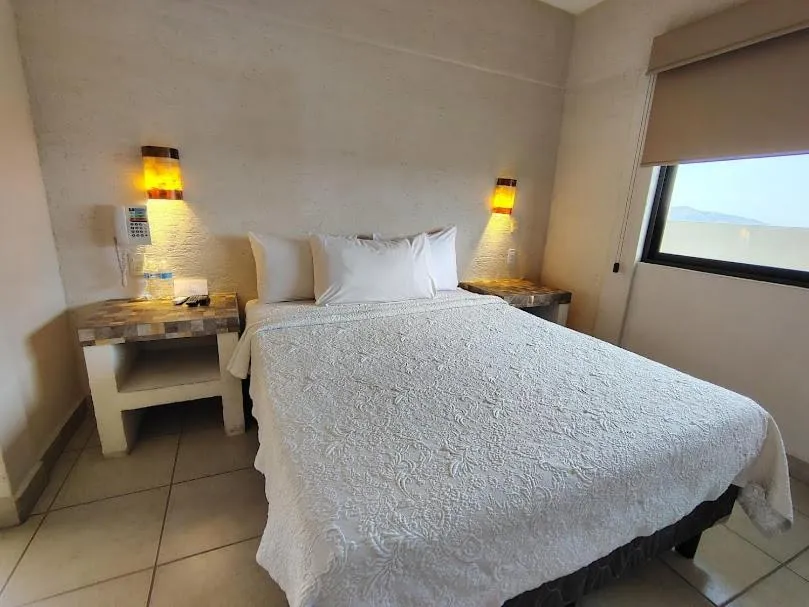 Bed in Hotel Coral Cuernavaca