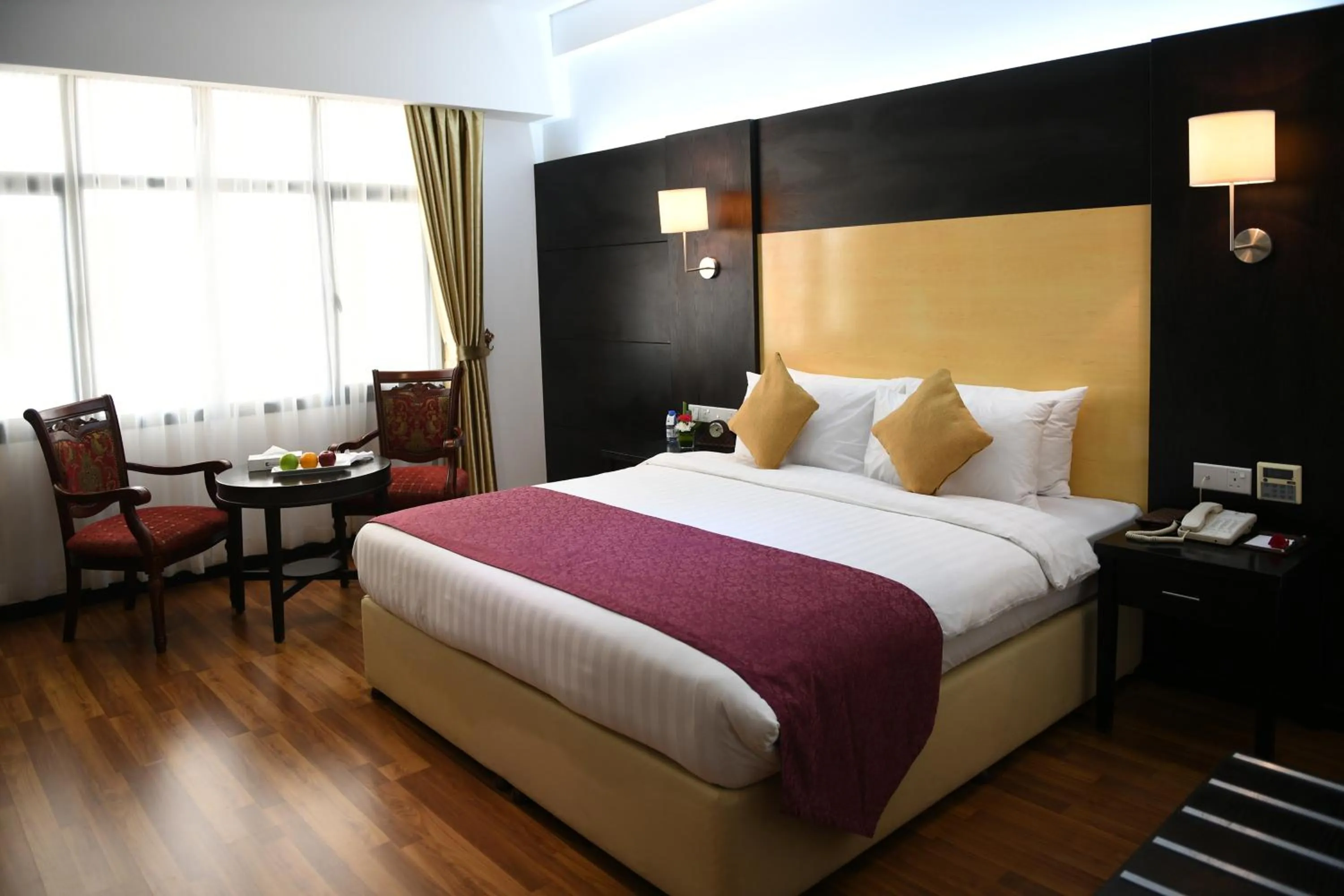 Seating area, Bed in Juffair Gate Hotel