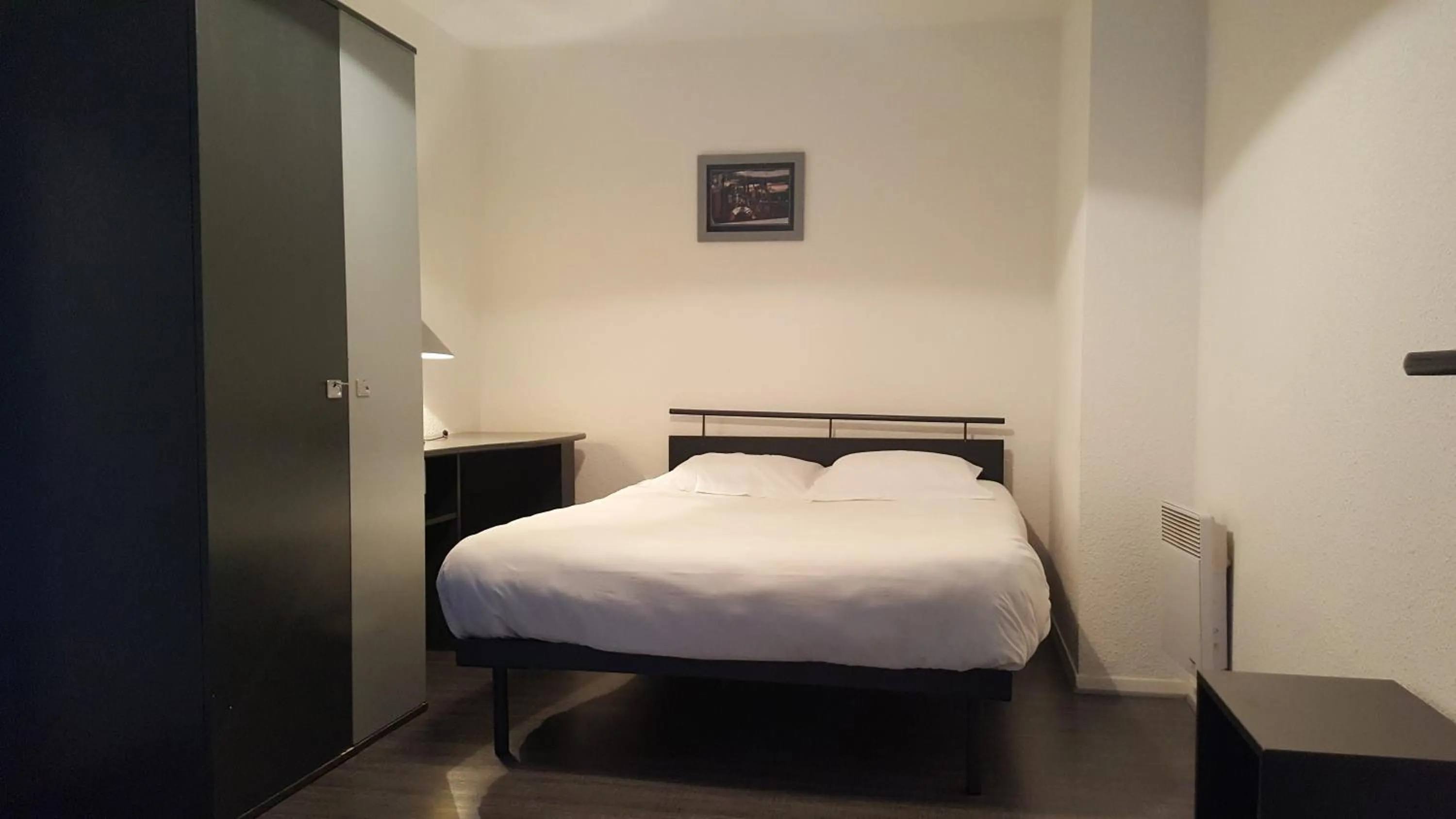 Bed in Résidence Hôtelière Poincaré