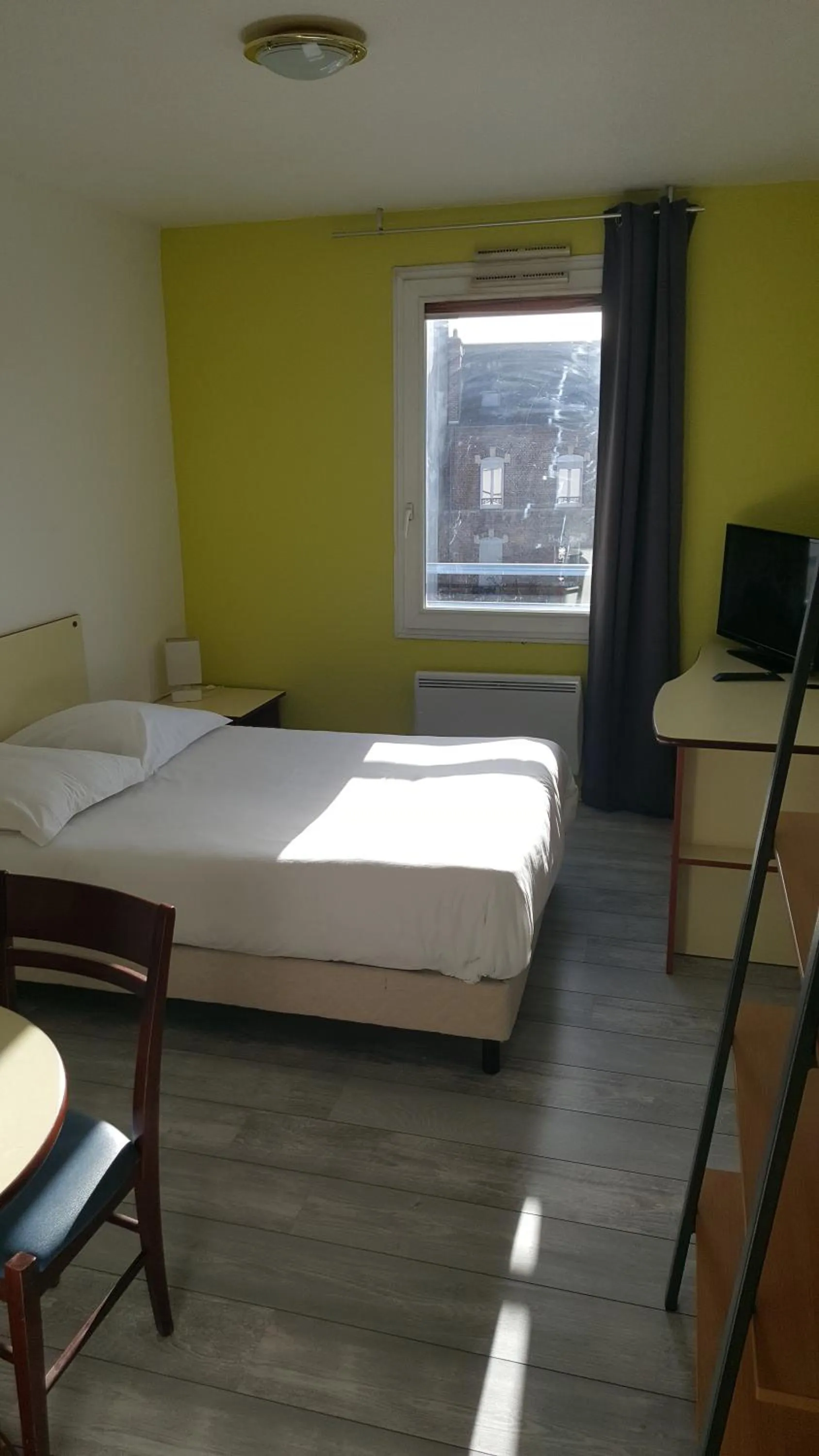 Bed in Résidence Hôtelière Poincaré