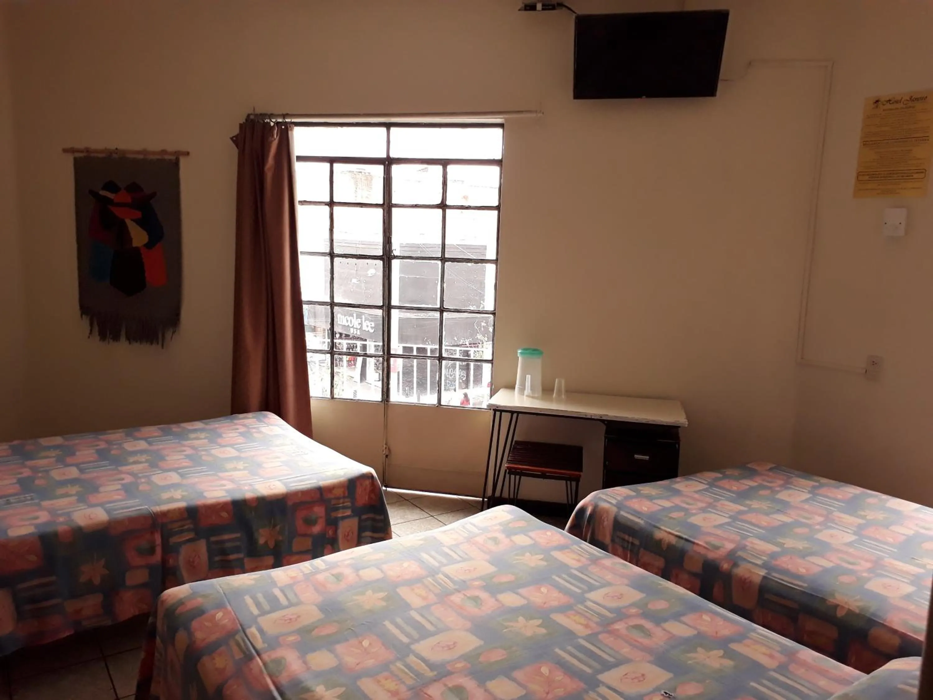 Bed in Hotel Janeiro