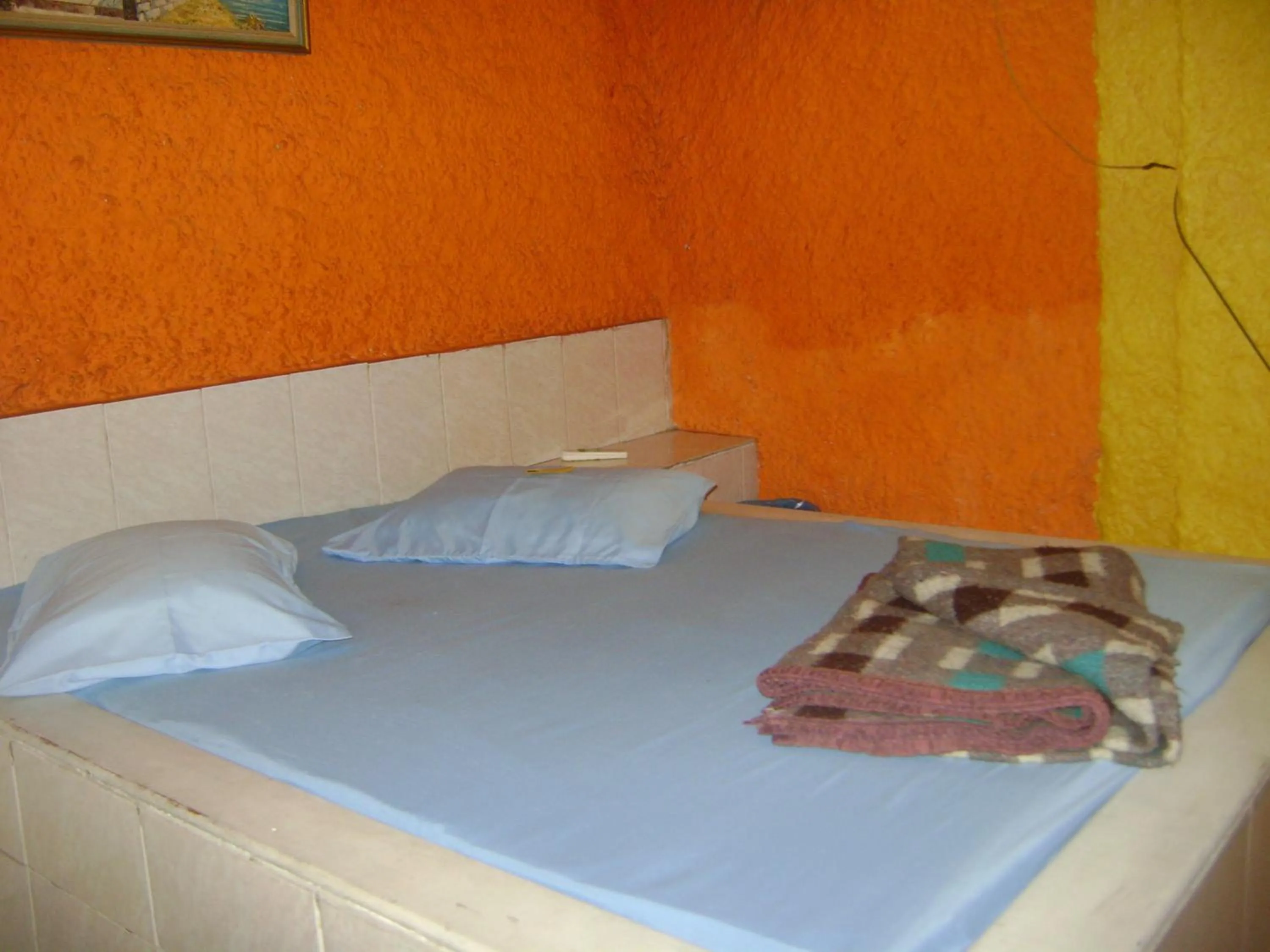 Bed in Hospedaria Nossa Senhora da Glória