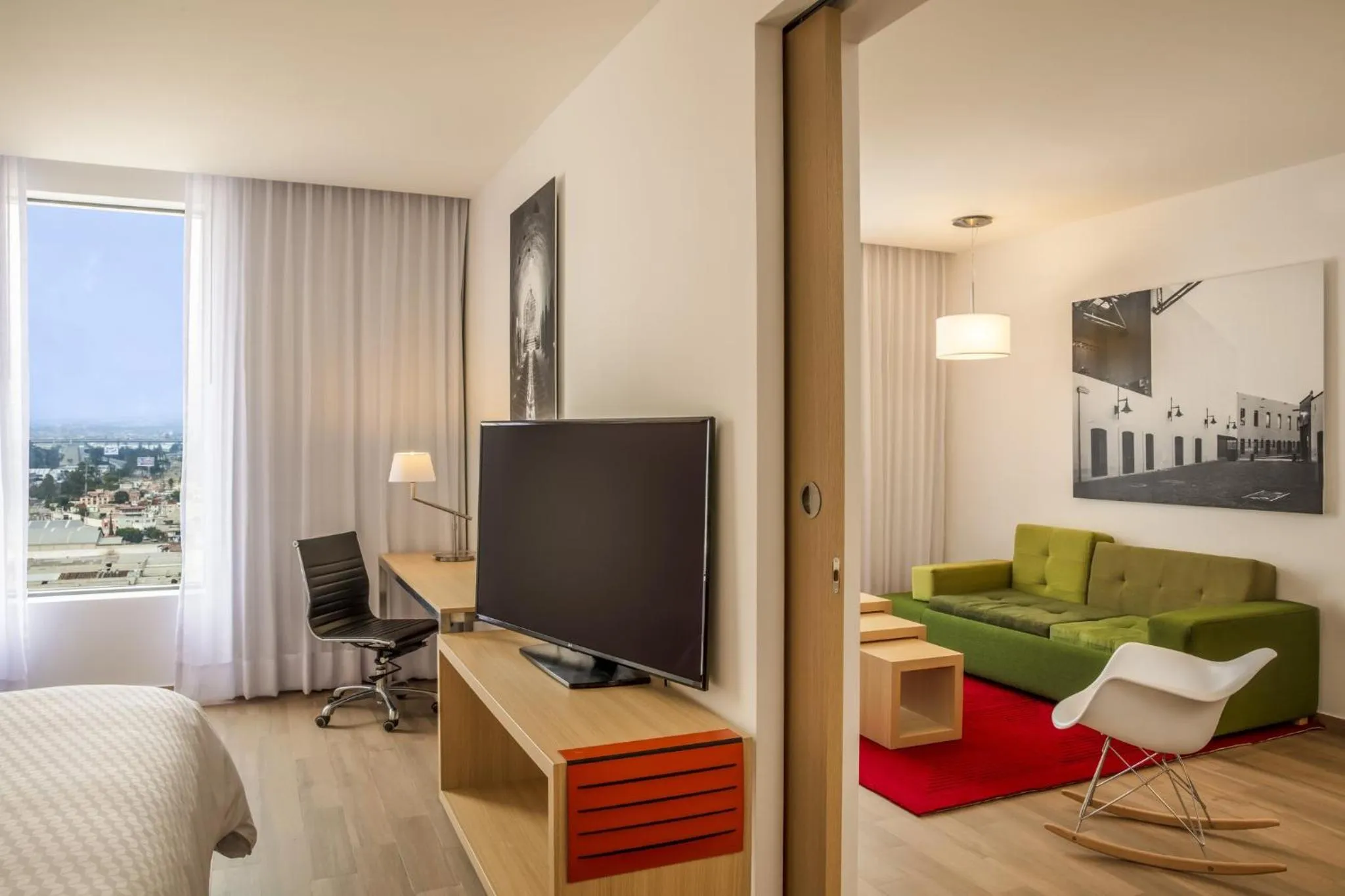 Photo of the whole room in Fiesta Inn Parque Puebla