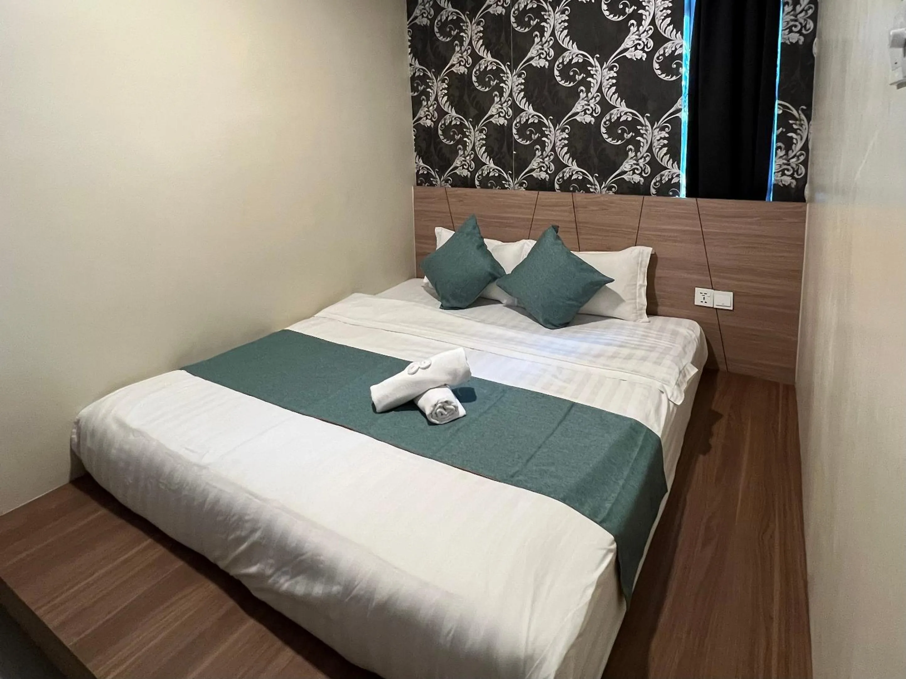 Bed in KUANTAN BESERAH BUDGET HOTEL
