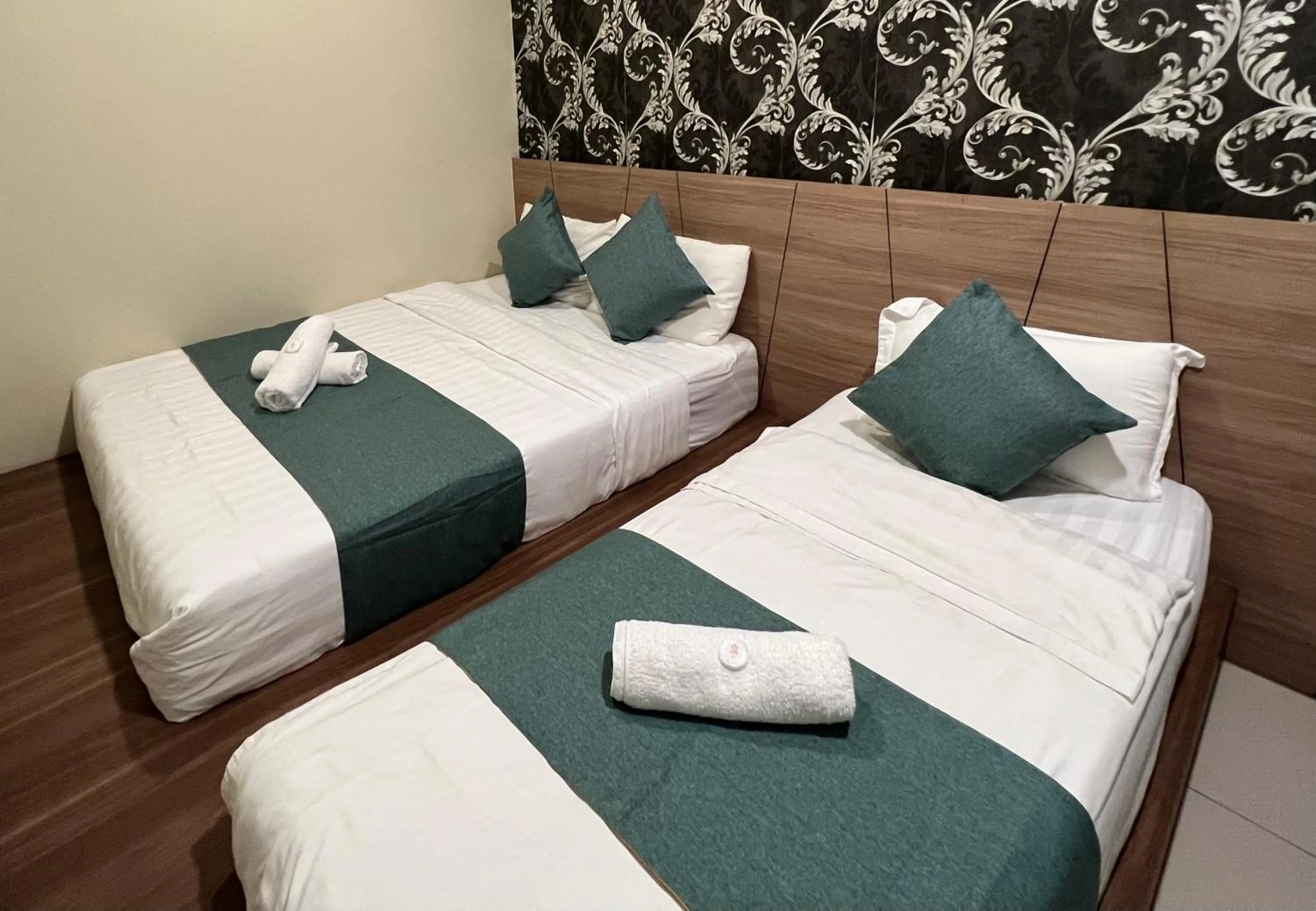 Bed in KUANTAN BESERAH BUDGET HOTEL