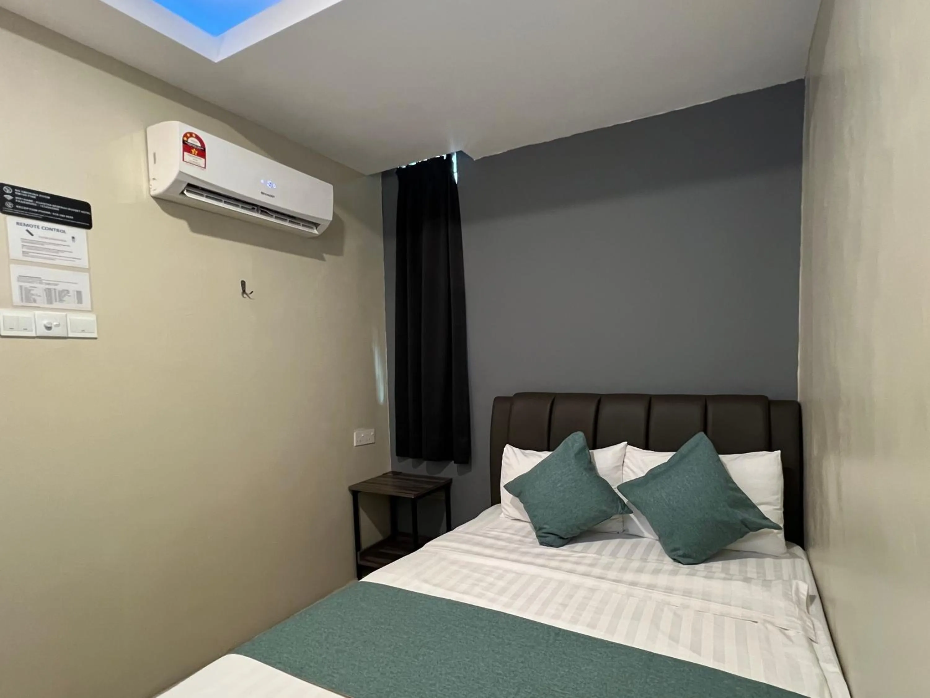 Bed in KUANTAN BESERAH BUDGET HOTEL