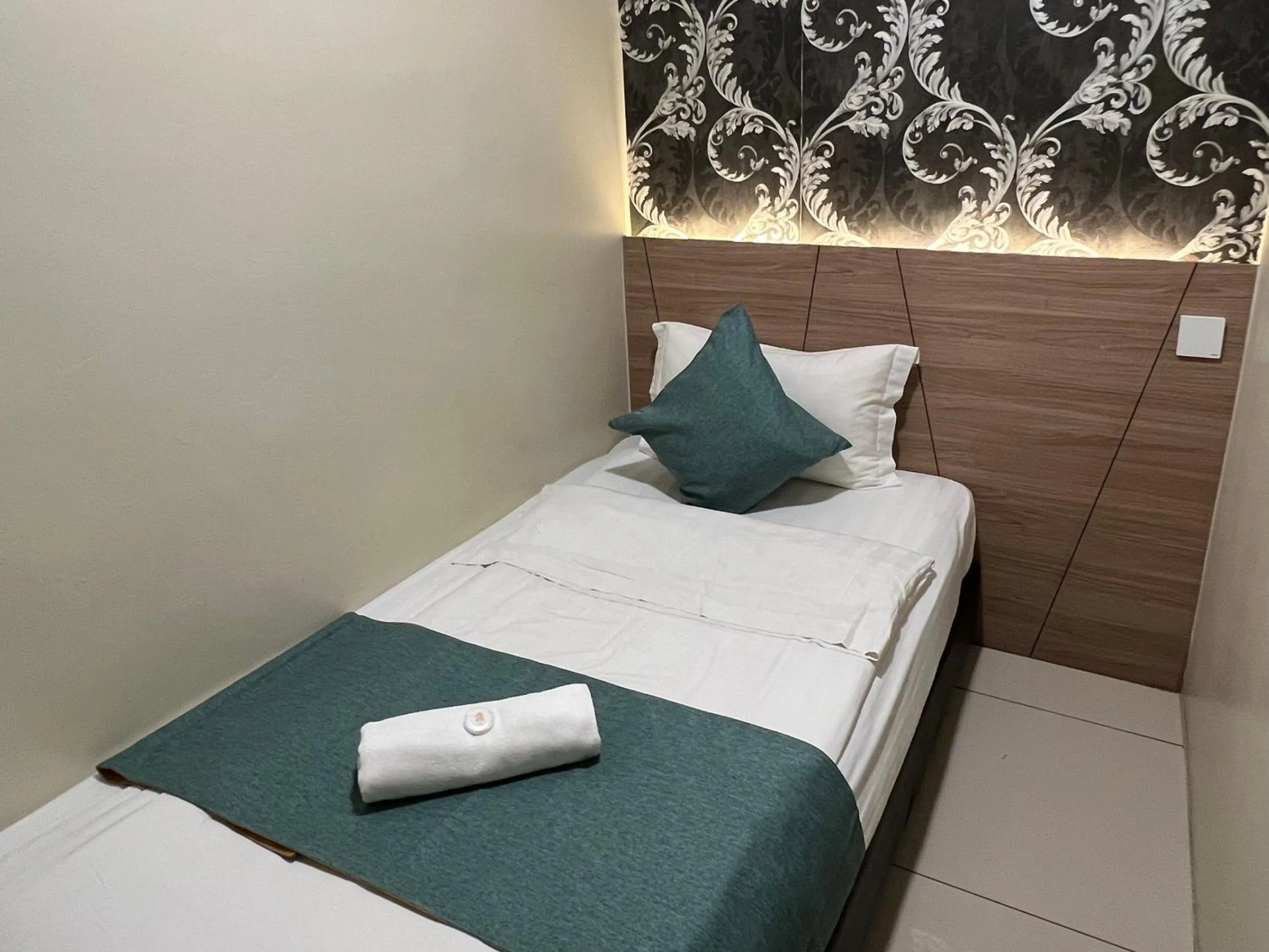 Bed in KUANTAN BESERAH BUDGET HOTEL