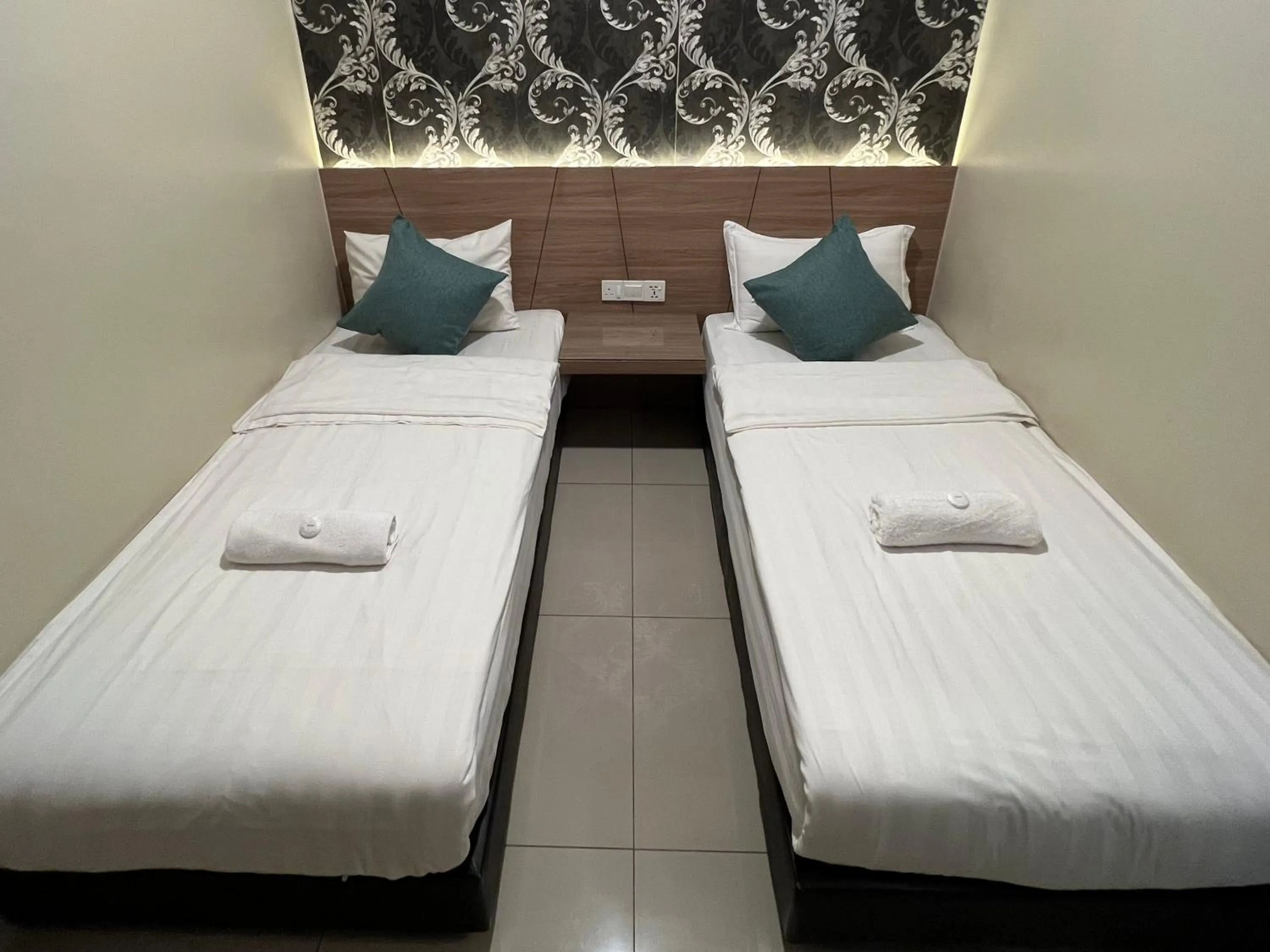 Bed in KUANTAN BESERAH BUDGET HOTEL