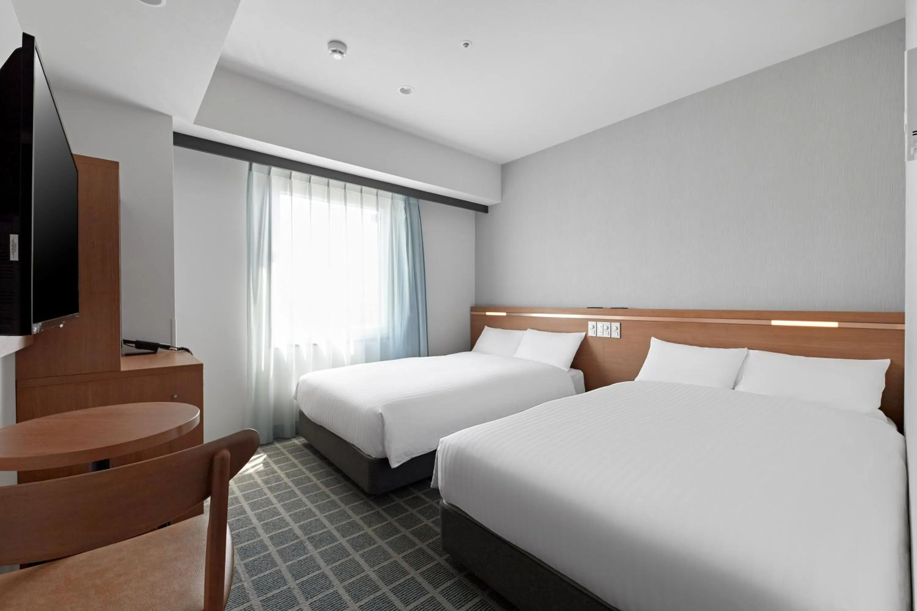 Photo of the whole room, Bed in Sotetsu Fresa Inn Kobe Sannomiya