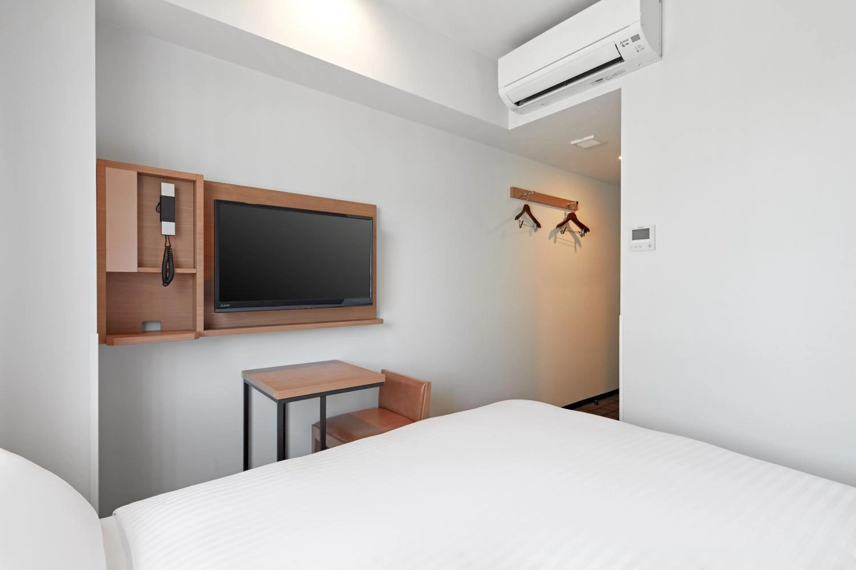 Photo of the whole room, Bed in Sotetsu Fresa Inn Kobe Sannomiya