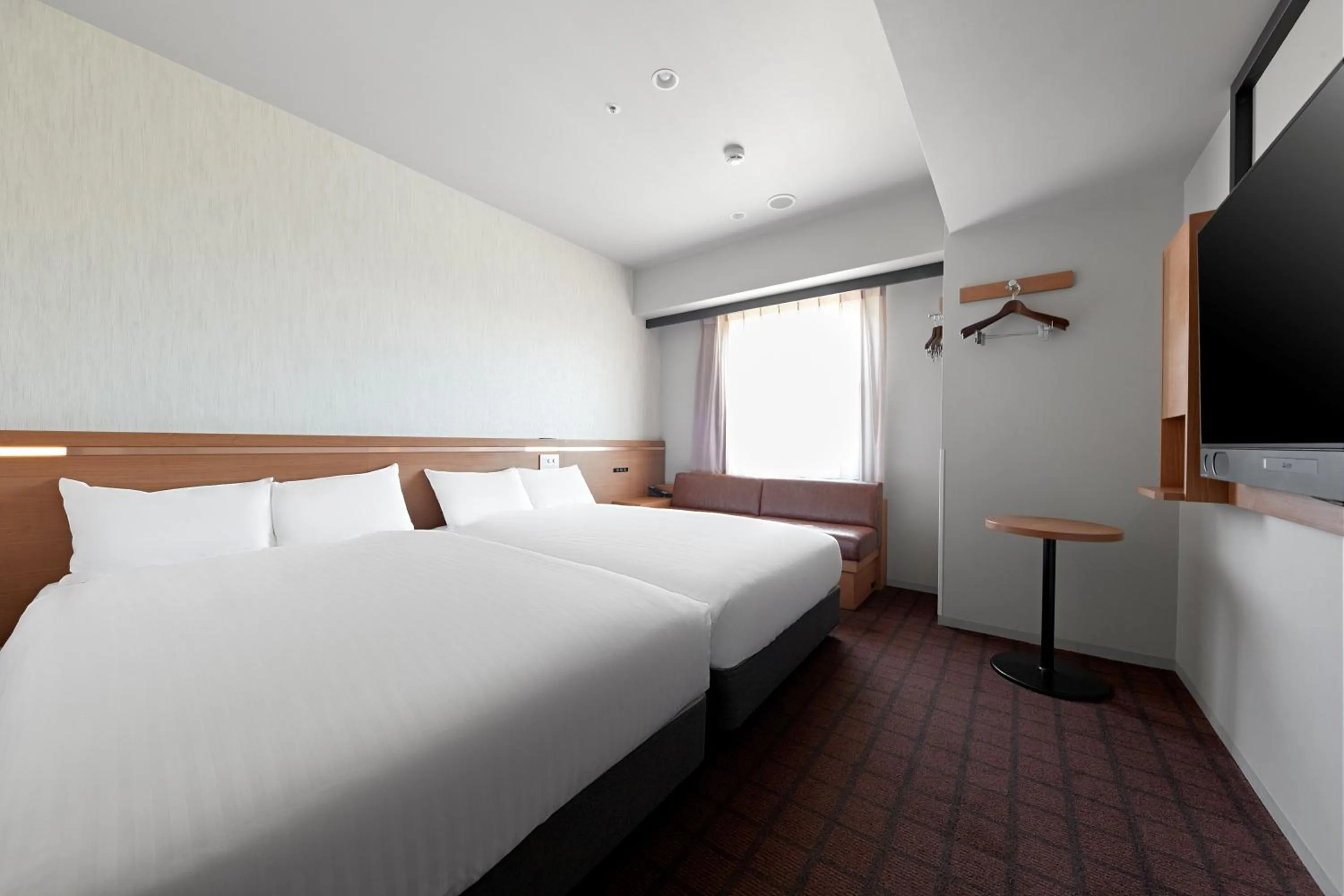 Photo of the whole room, Bed in Sotetsu Fresa Inn Kobe Sannomiya