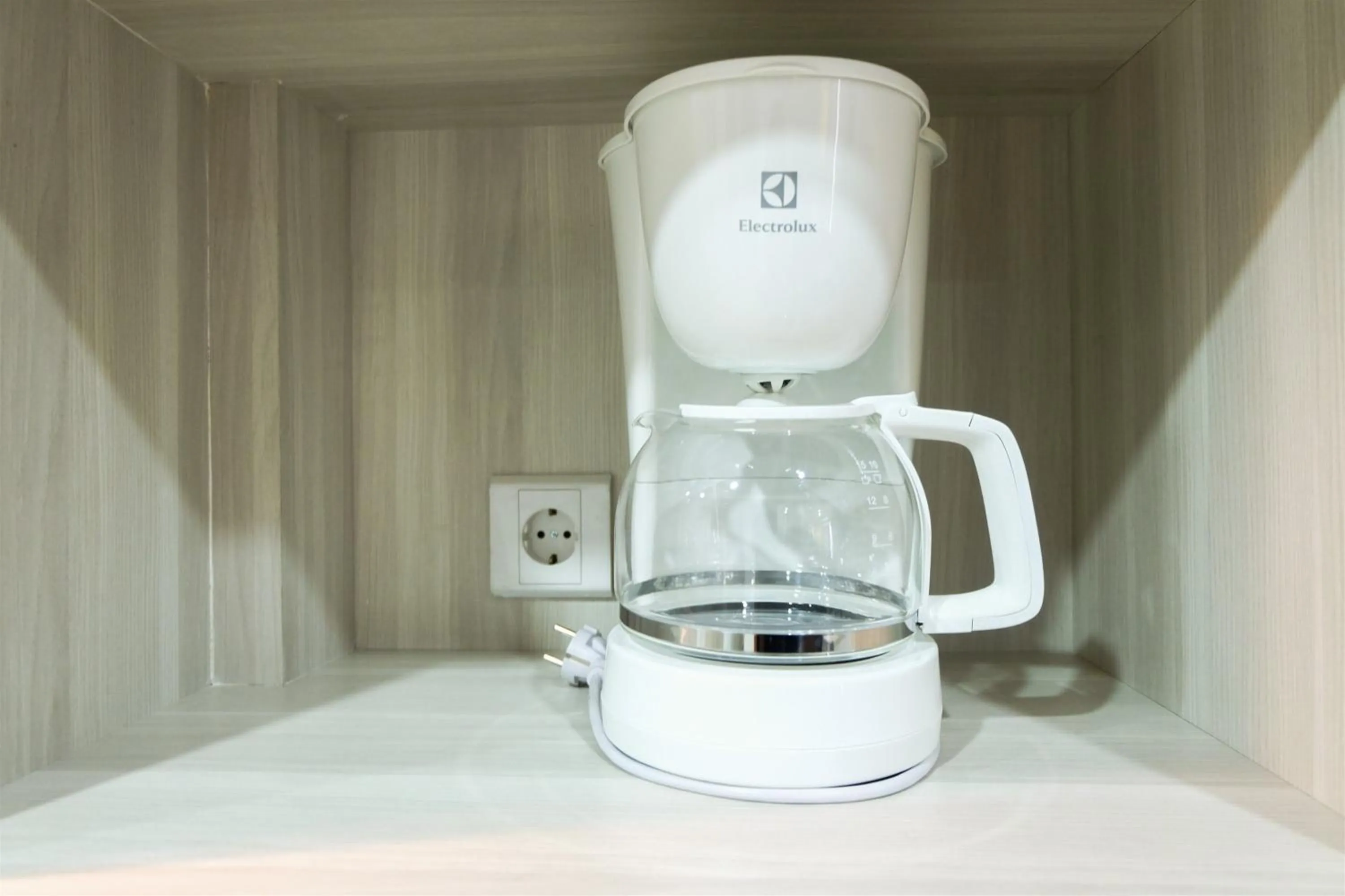 Studio Room Azalea Suites Apartment By Travelio