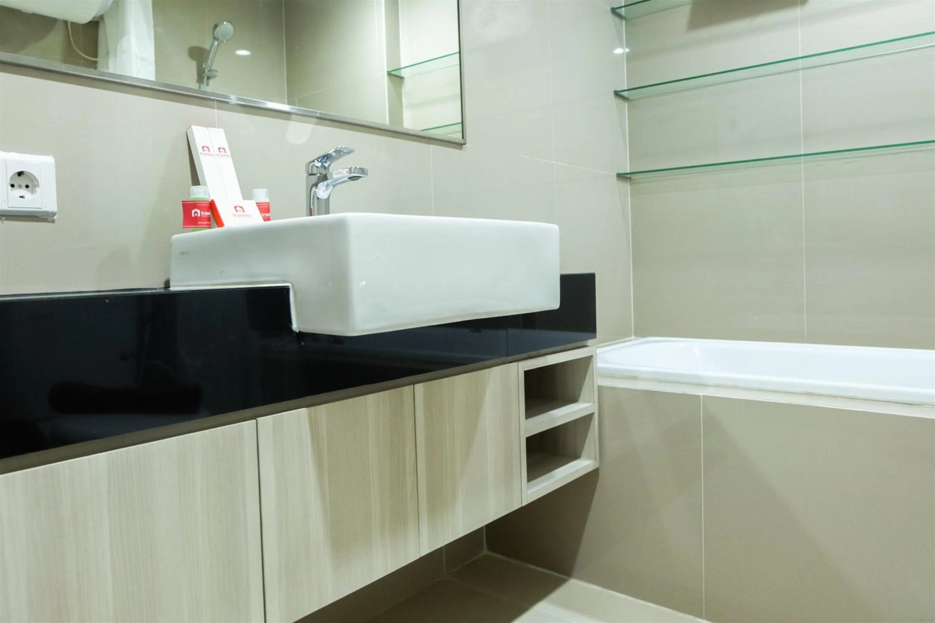 Studio Room Azalea Suites Apartment By Travelio