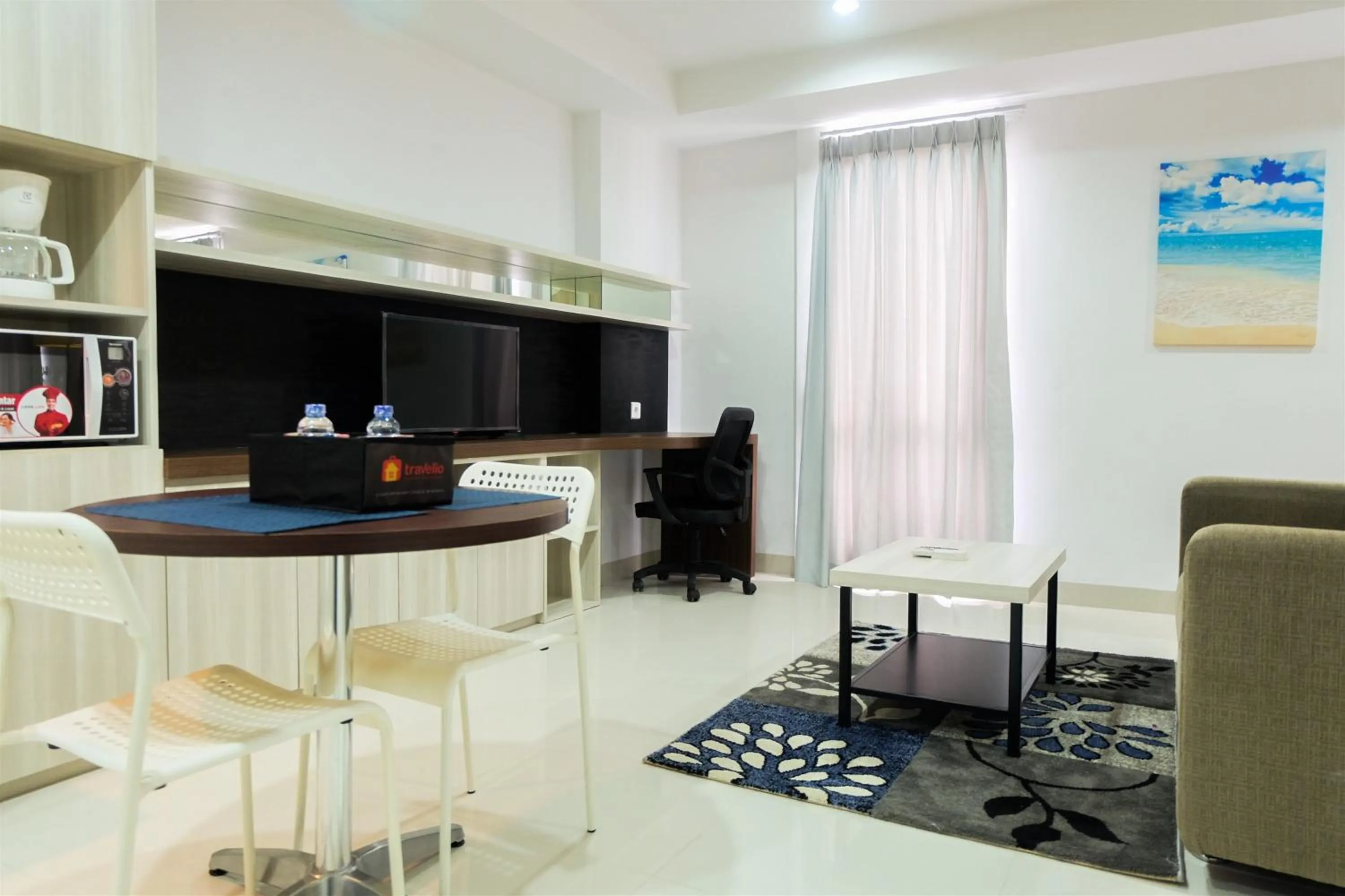 Studio Room Azalea Suites Apartment By Travelio