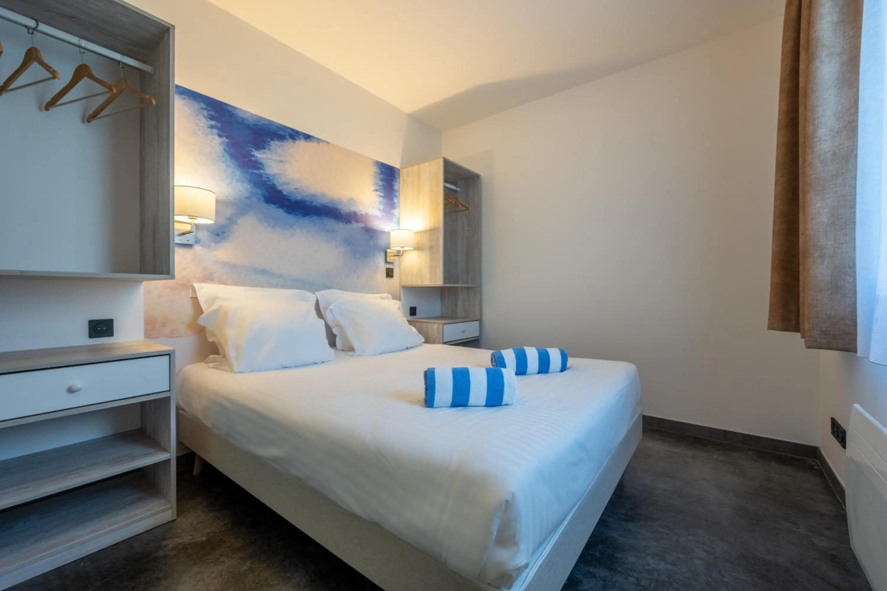 Bed in Côté Océan Resort