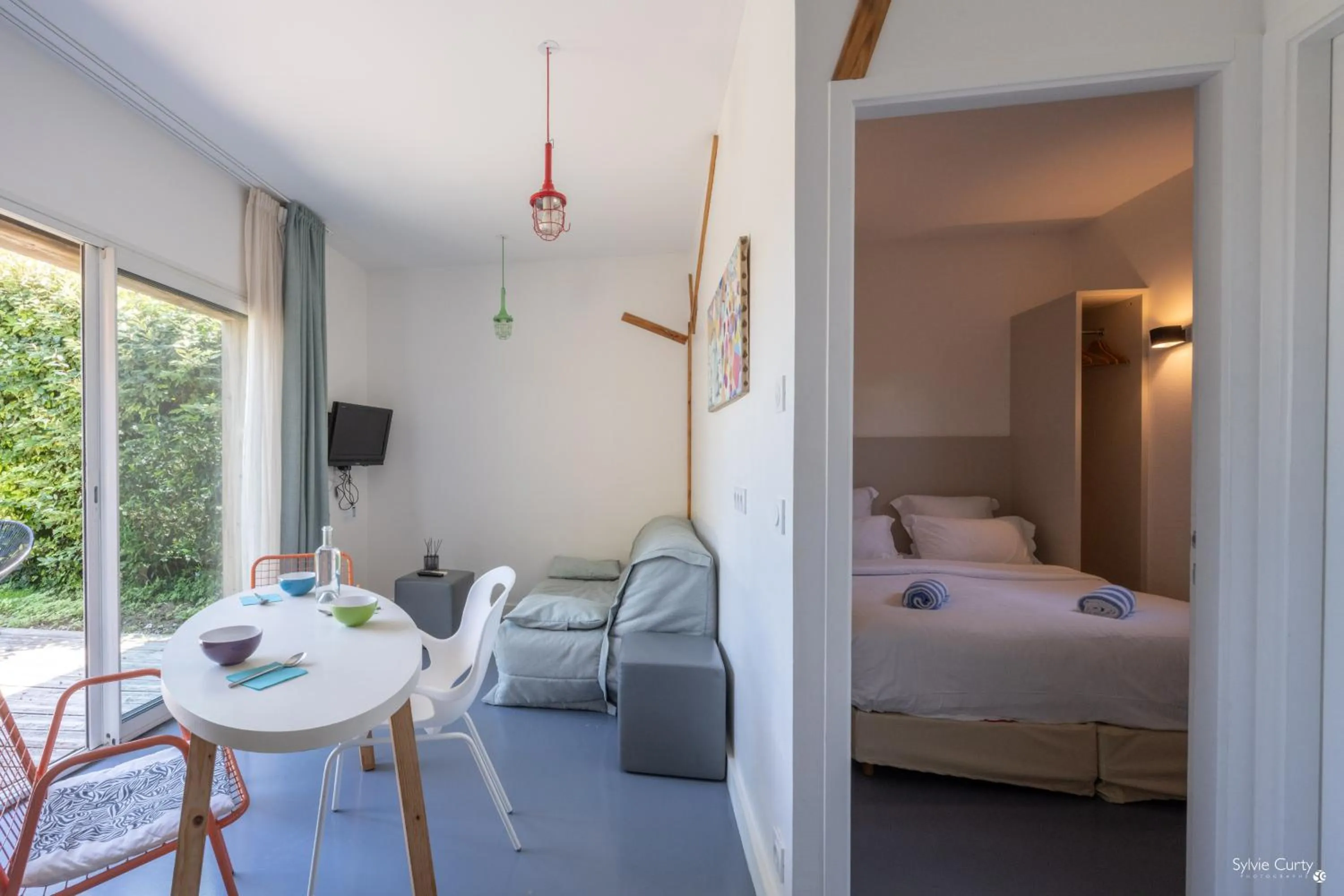 Patio, Bed in Côté Océan Resort