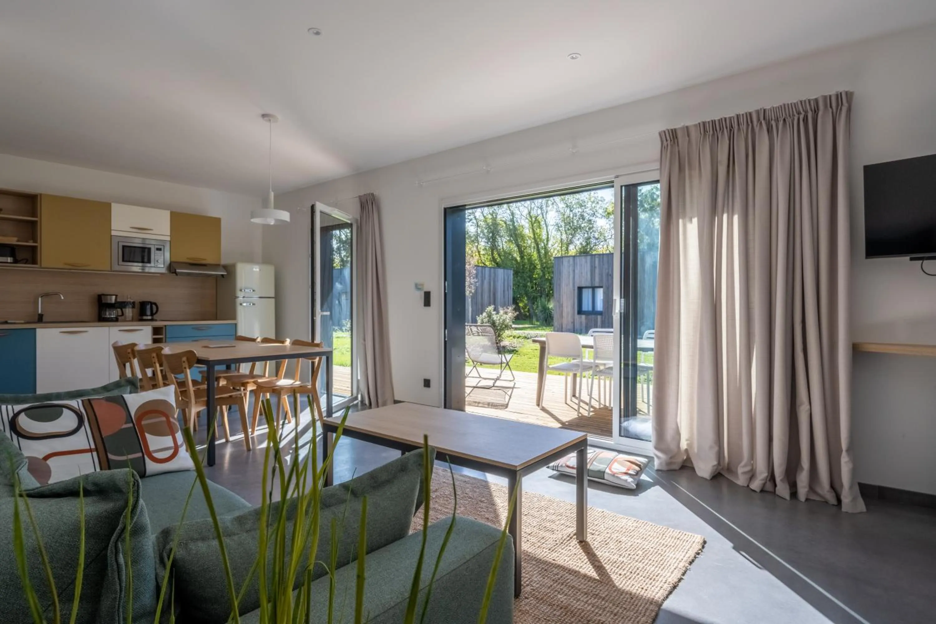 Communal lounge/ TV room in Côté Océan Resort