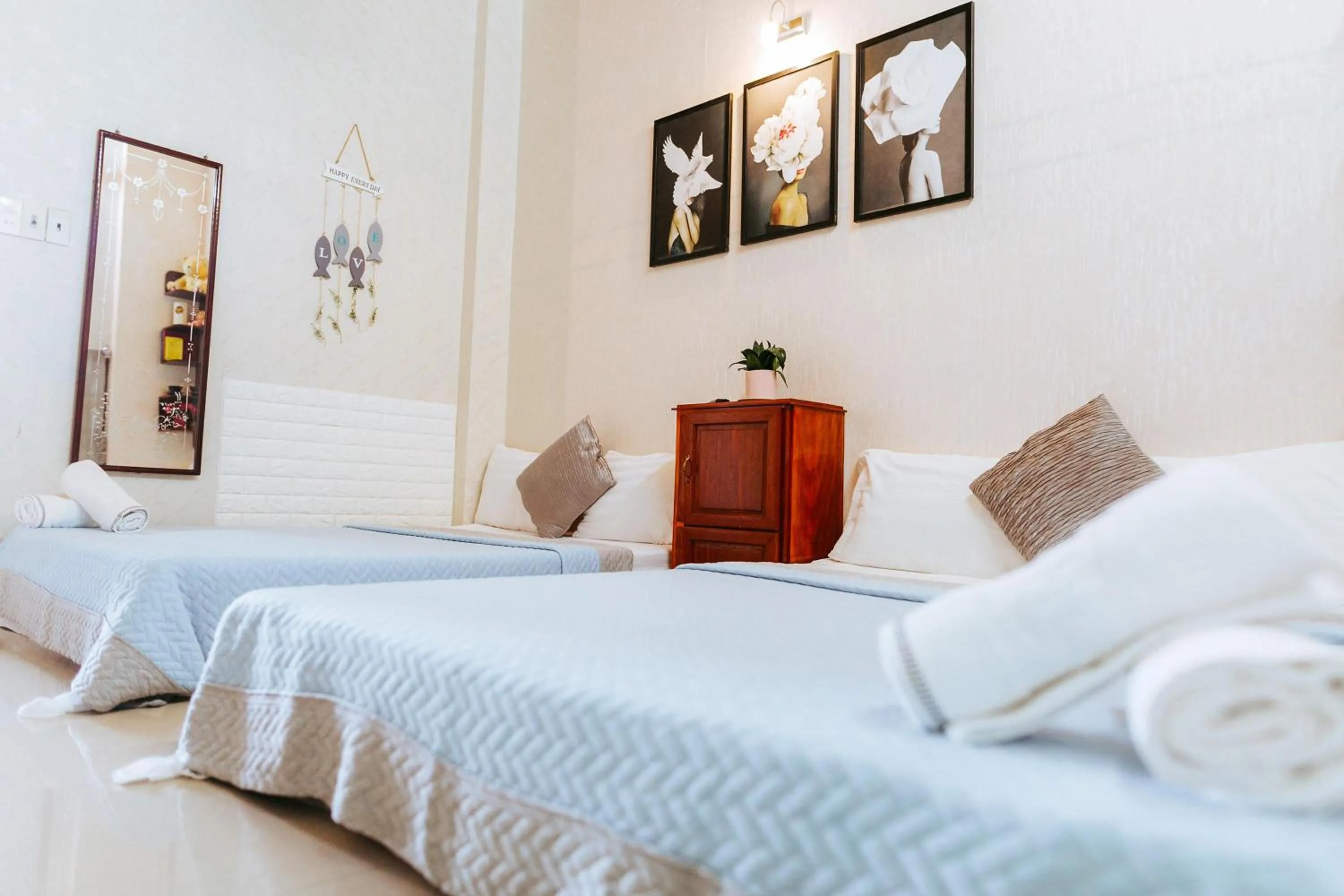 Bed in Kota's House Homestay