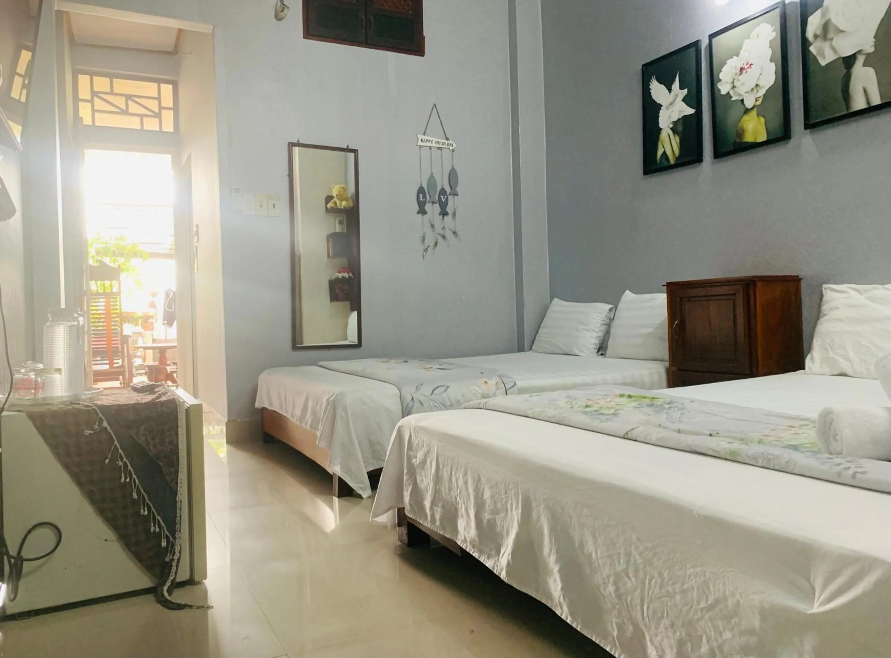 Bed in Kota's House Homestay