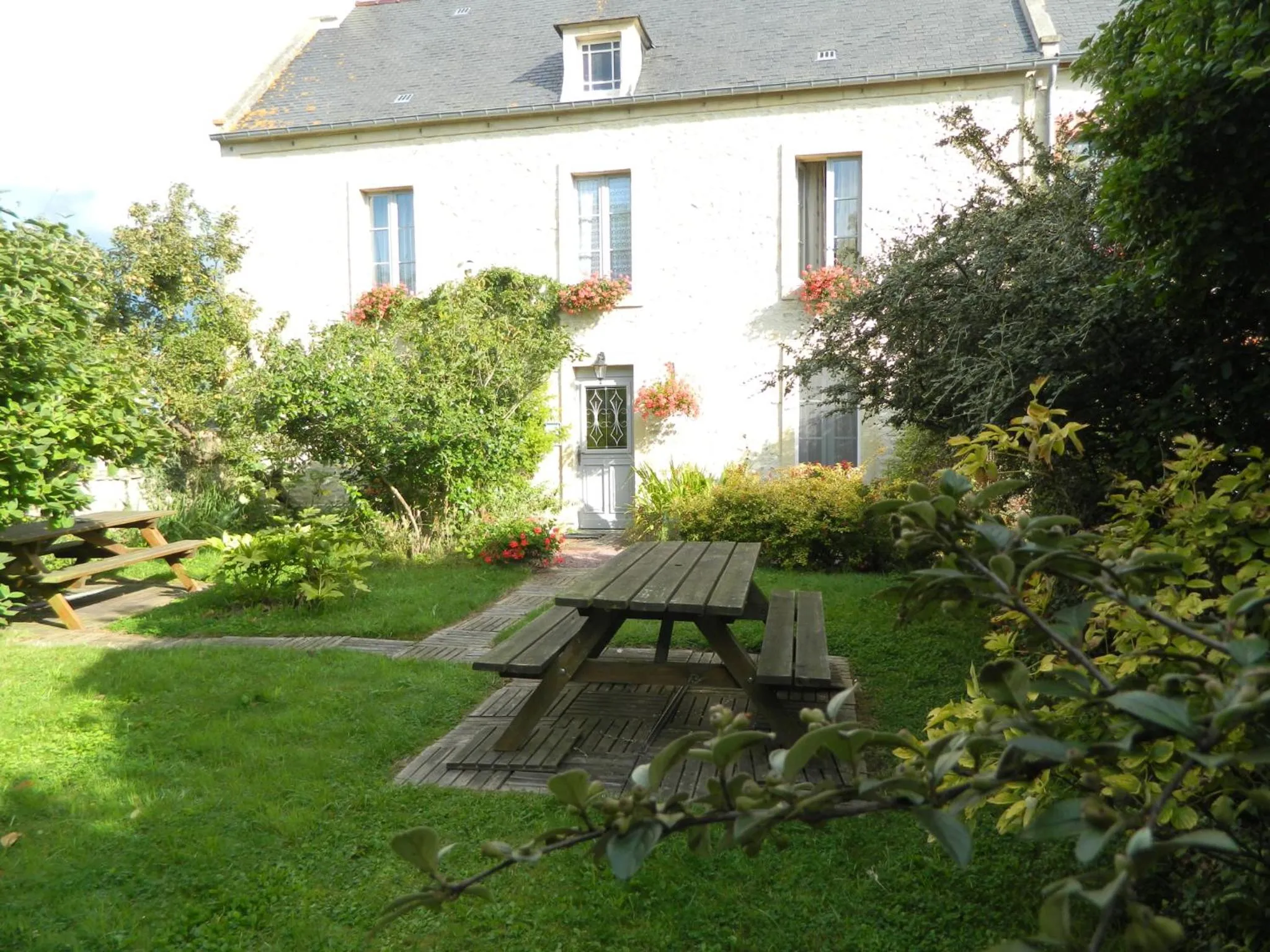 Garden view in Chambres d'Hôtes Le Clos Tassin