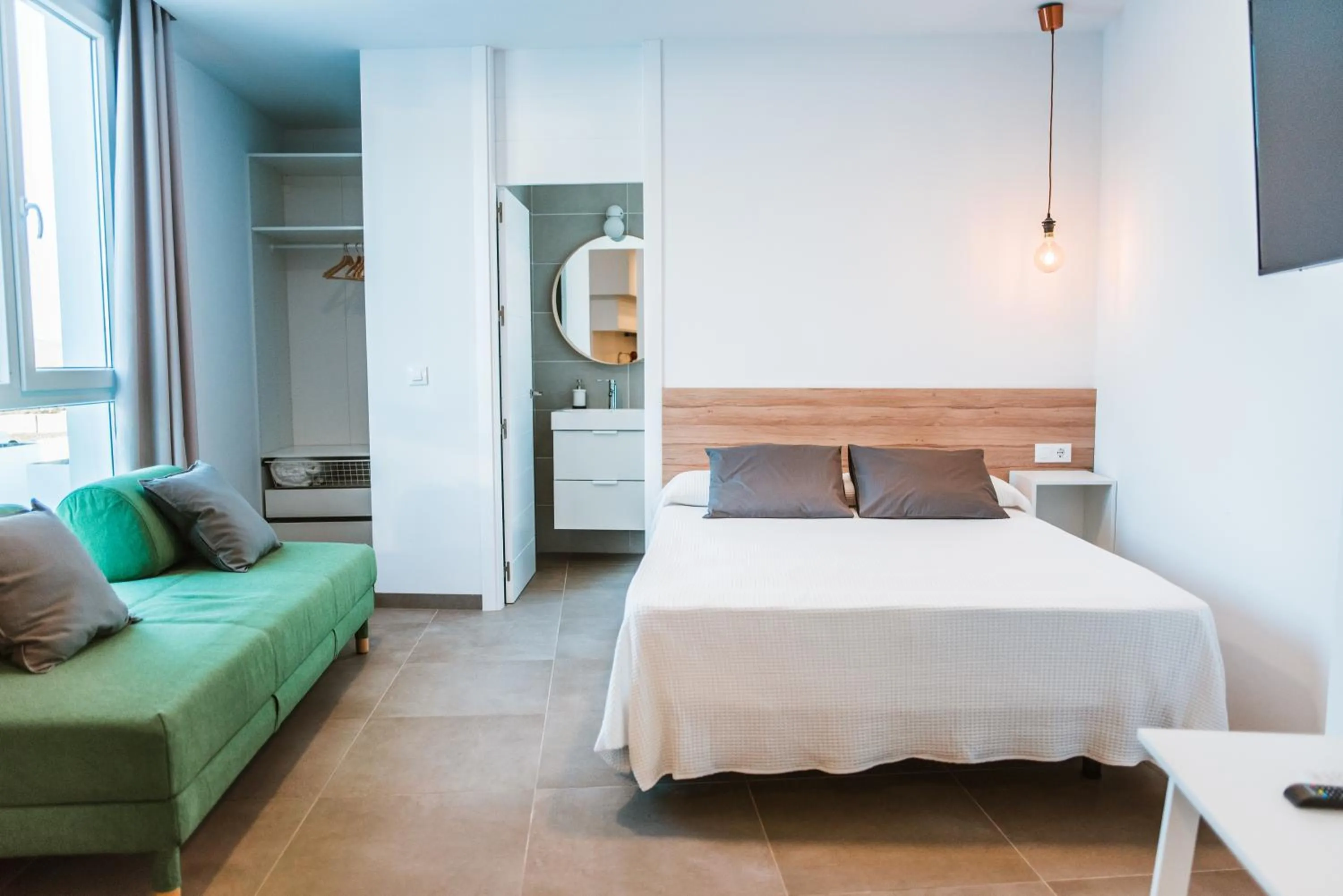 Living room, Bed in Apartamentos ZHR