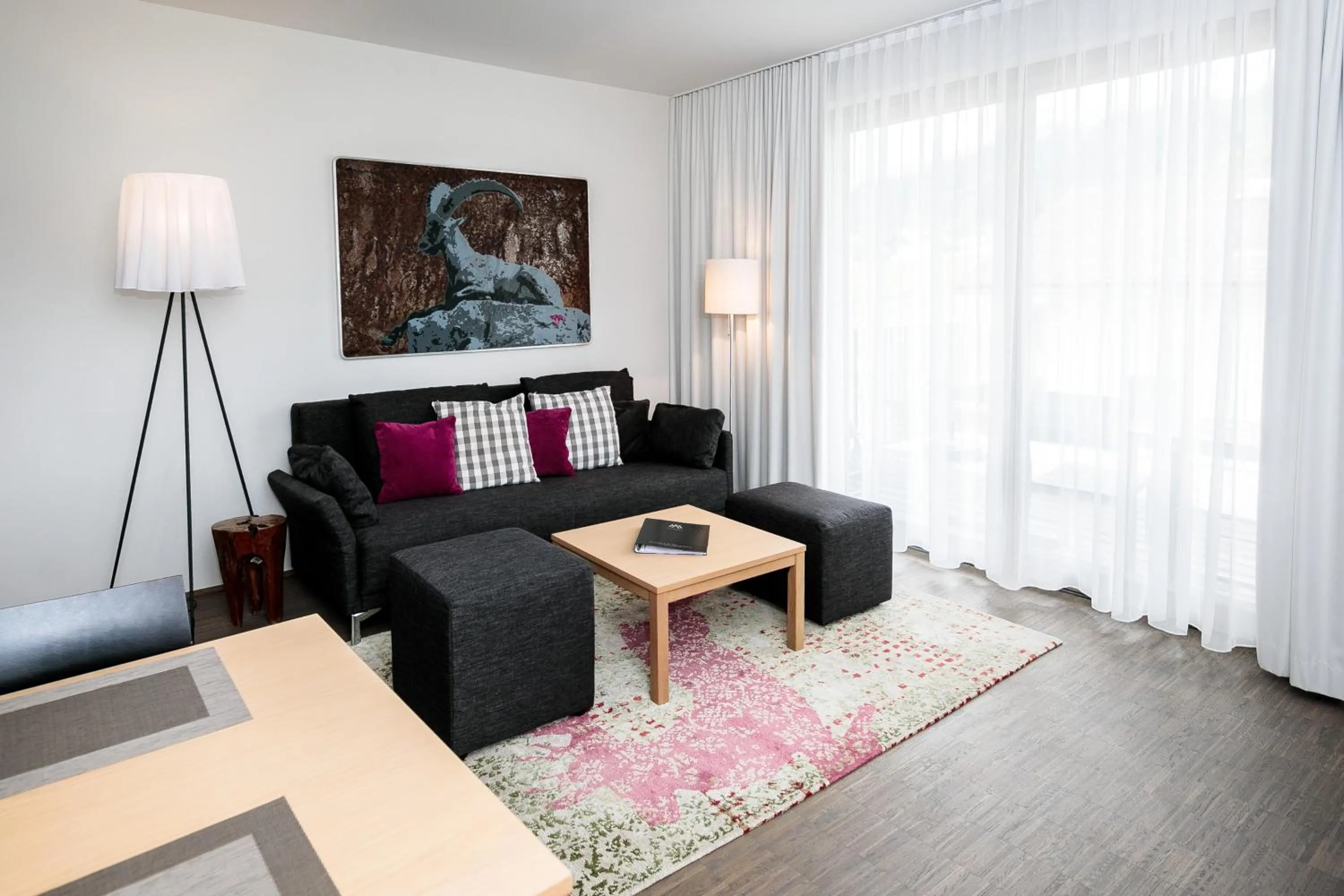 Living room in Alpenrock Schladming by ALPS RESORTS