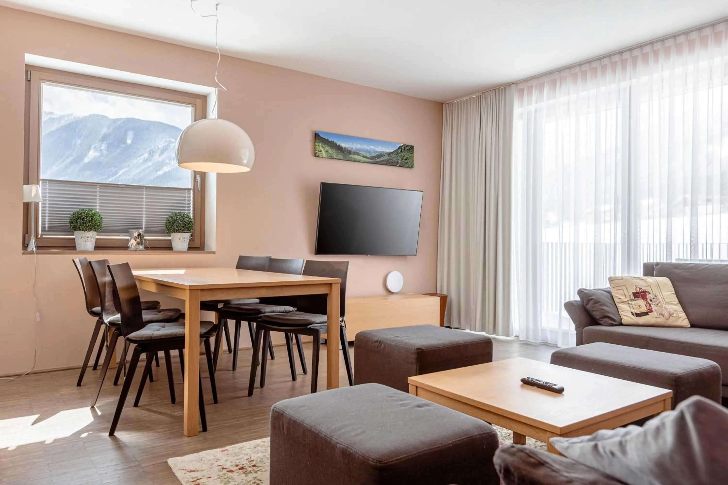 Communal lounge/ TV room in Alpenrock Schladming by ALPS RESORTS