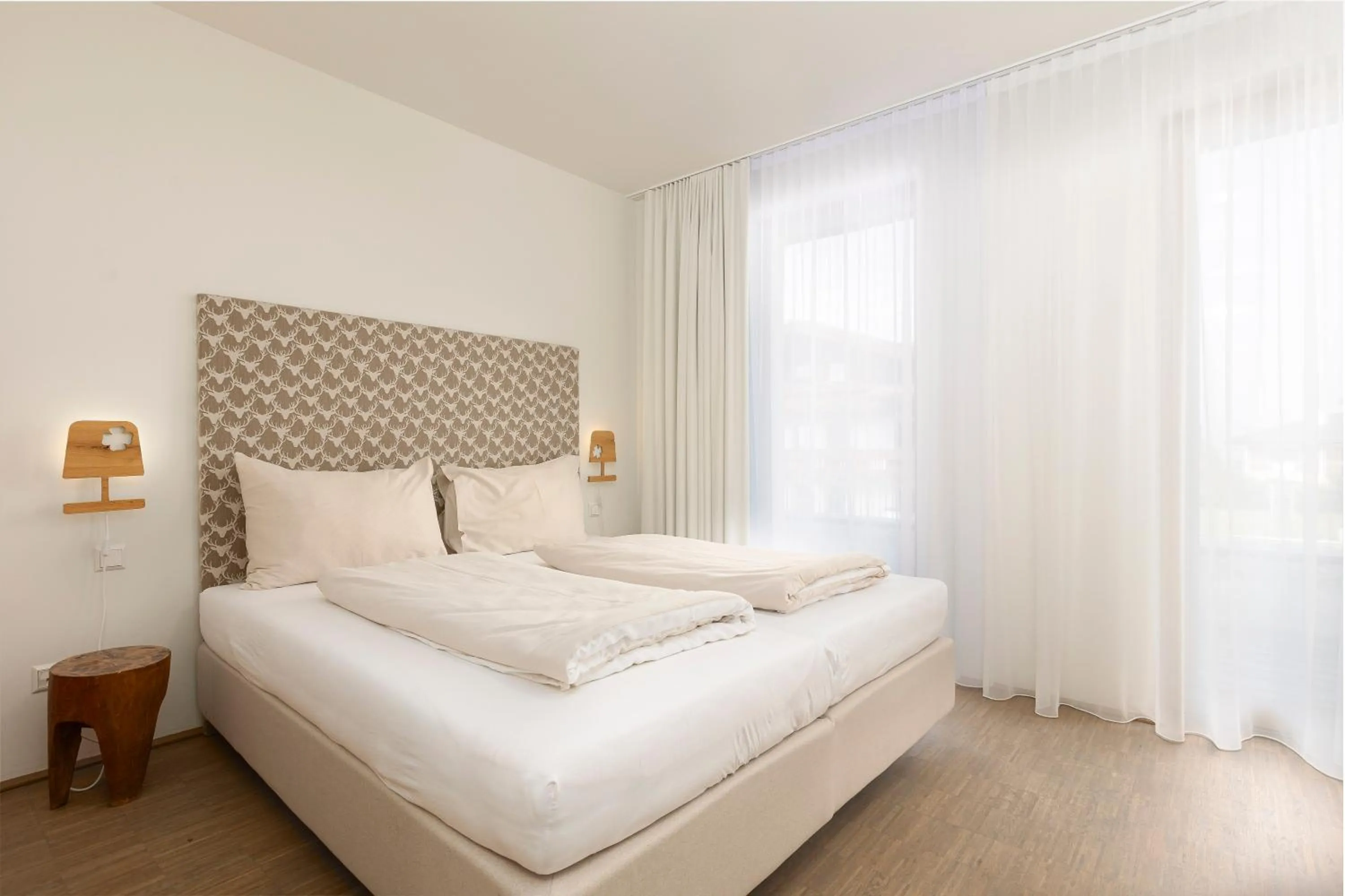 Bed in Alpenrock Schladming by ALPS RESORTS