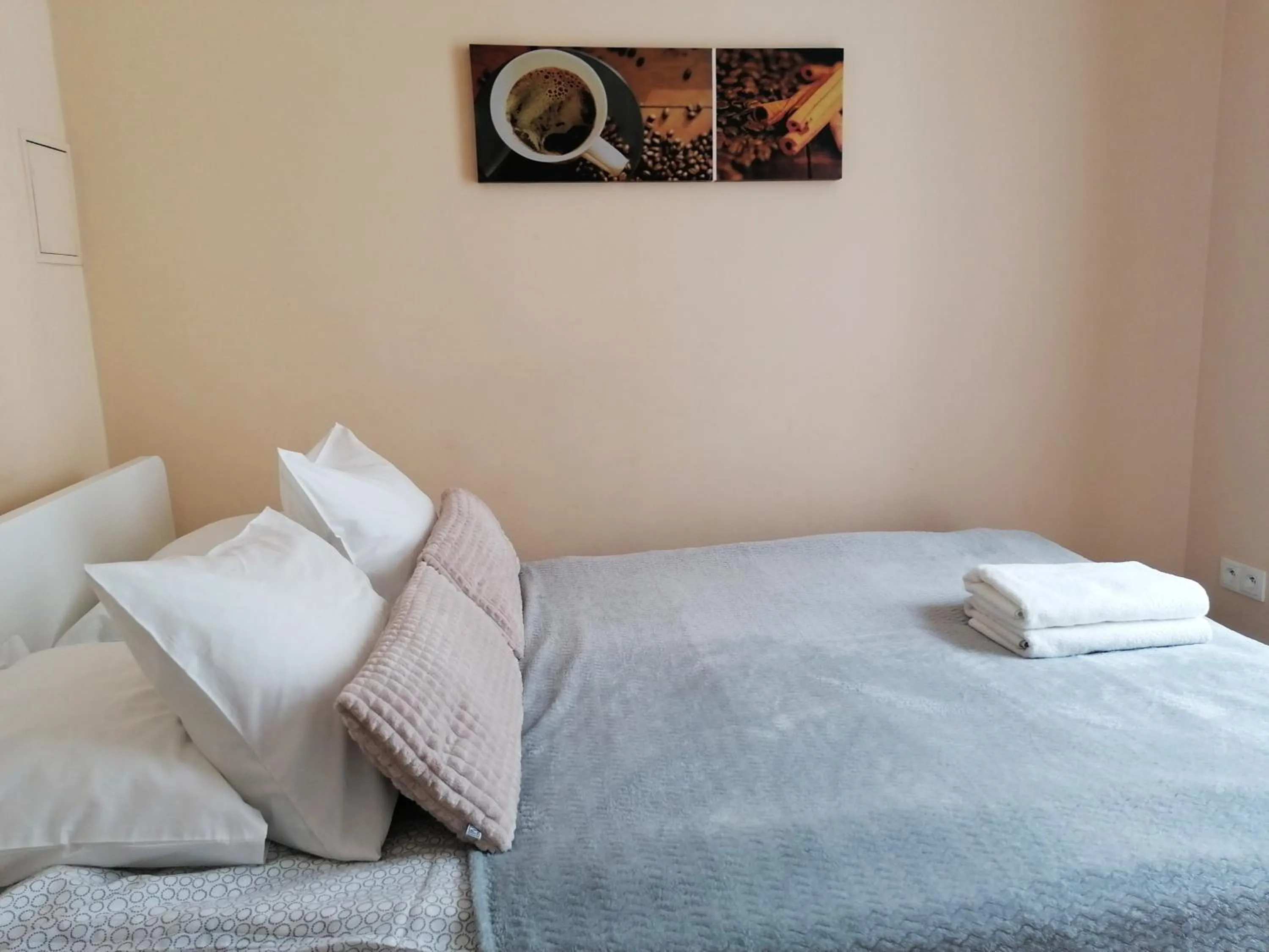 Bed in NotaBene Wola Apartment