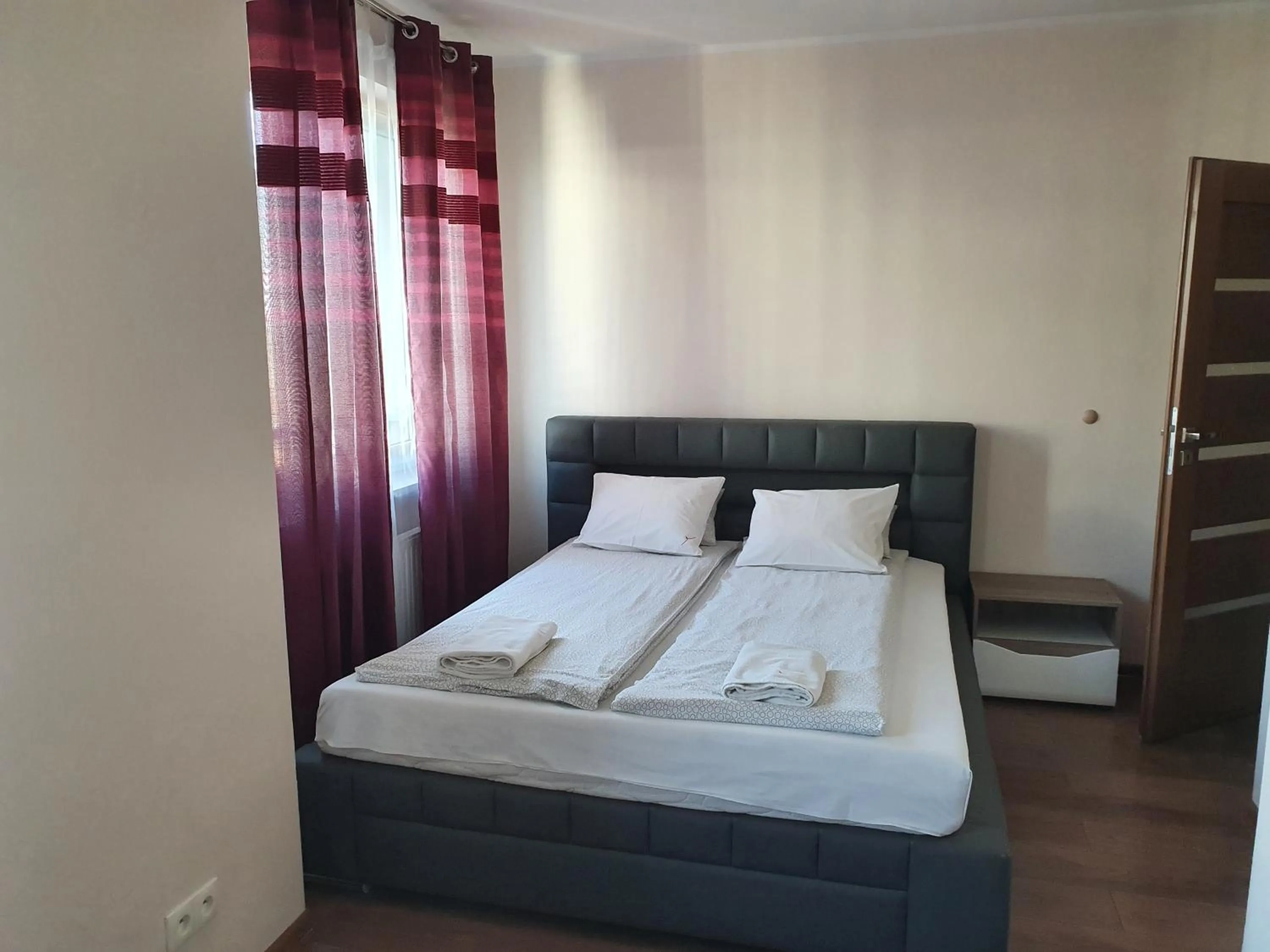 Bed in NotaBene Wola Apartment