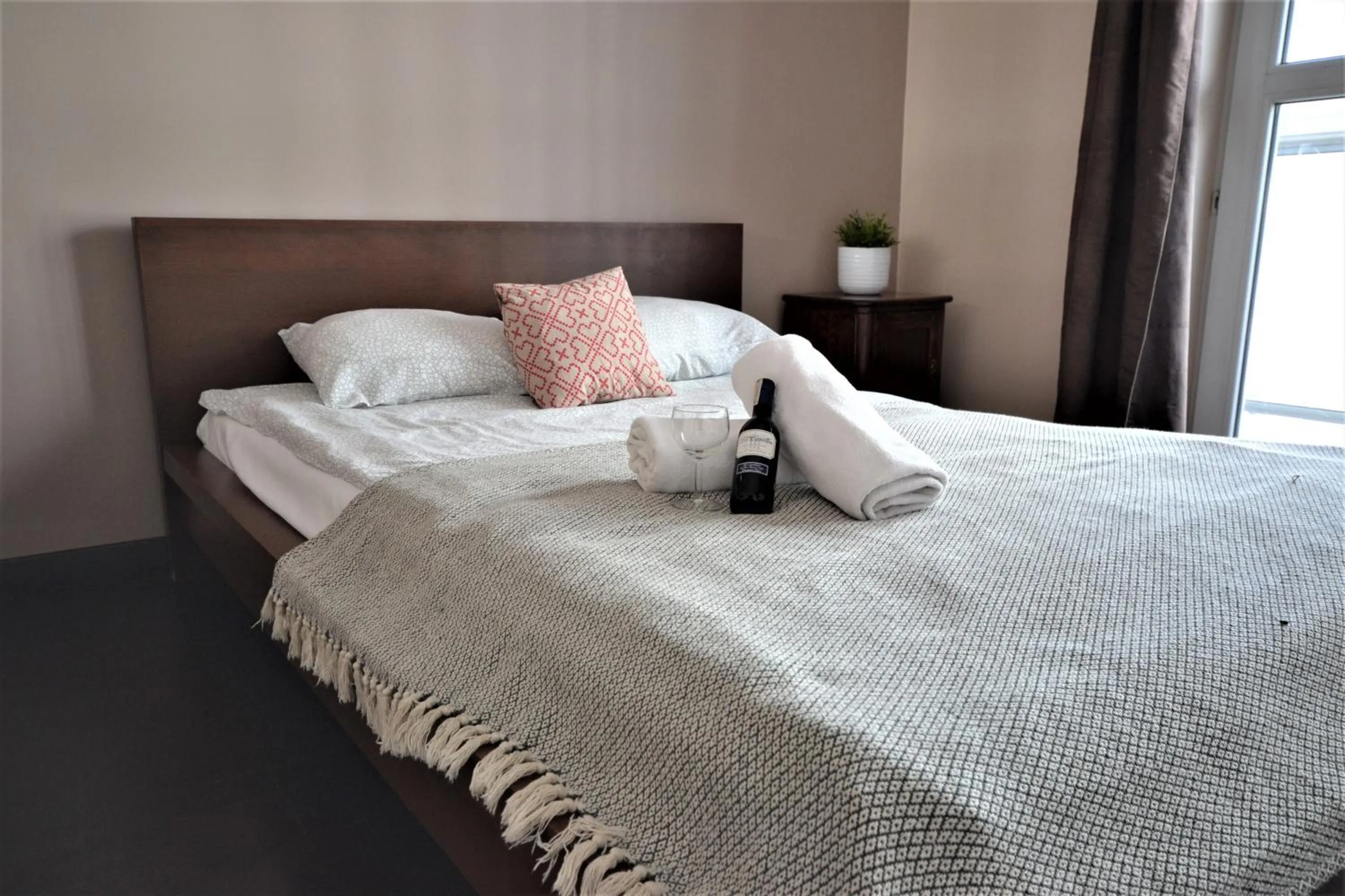 Bed in NotaBene Wola Apartment