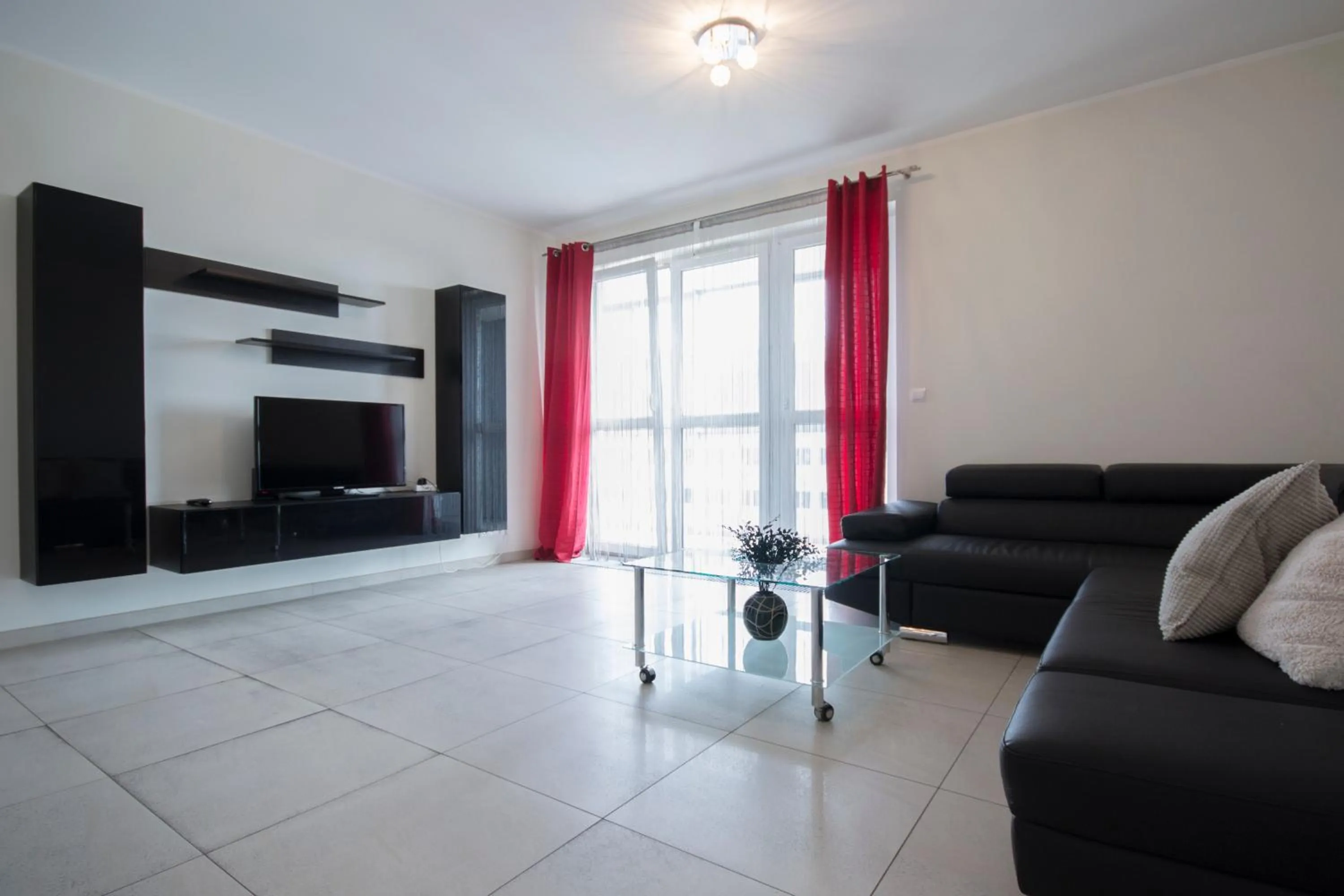 Living room in NotaBene Wola Apartment