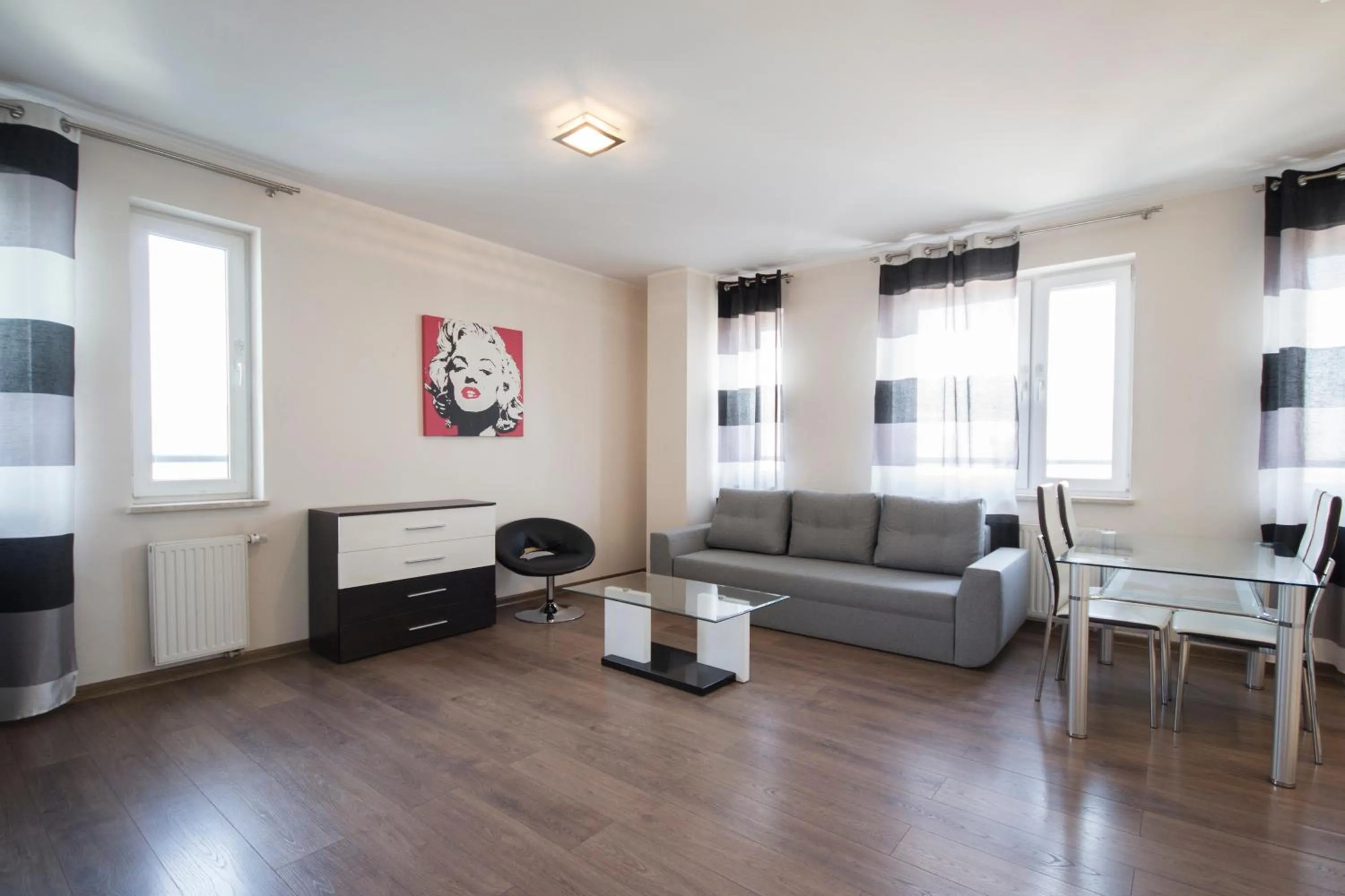 Living room in NotaBene Wola Apartment