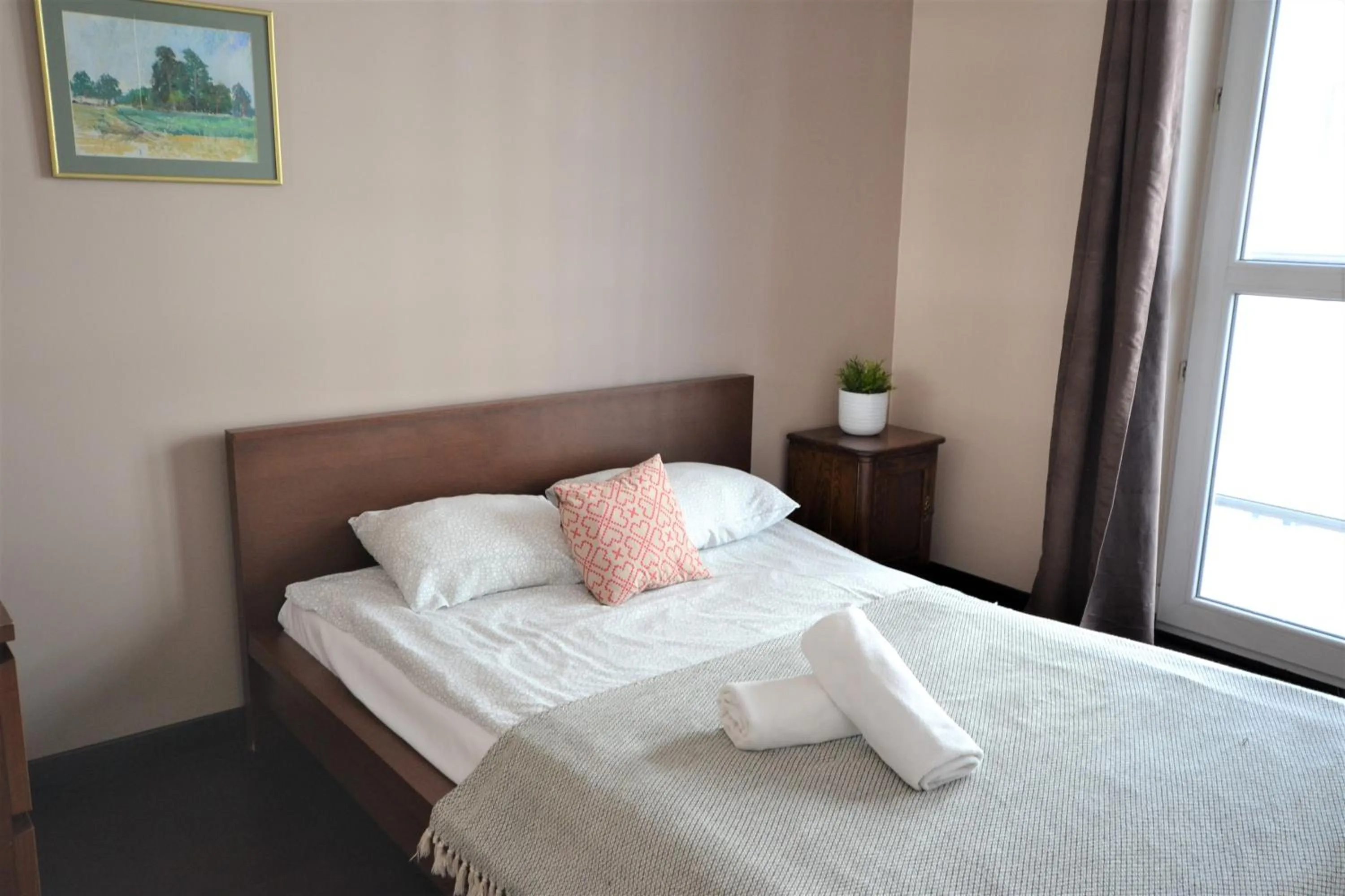 Bed in NotaBene Wola Apartment