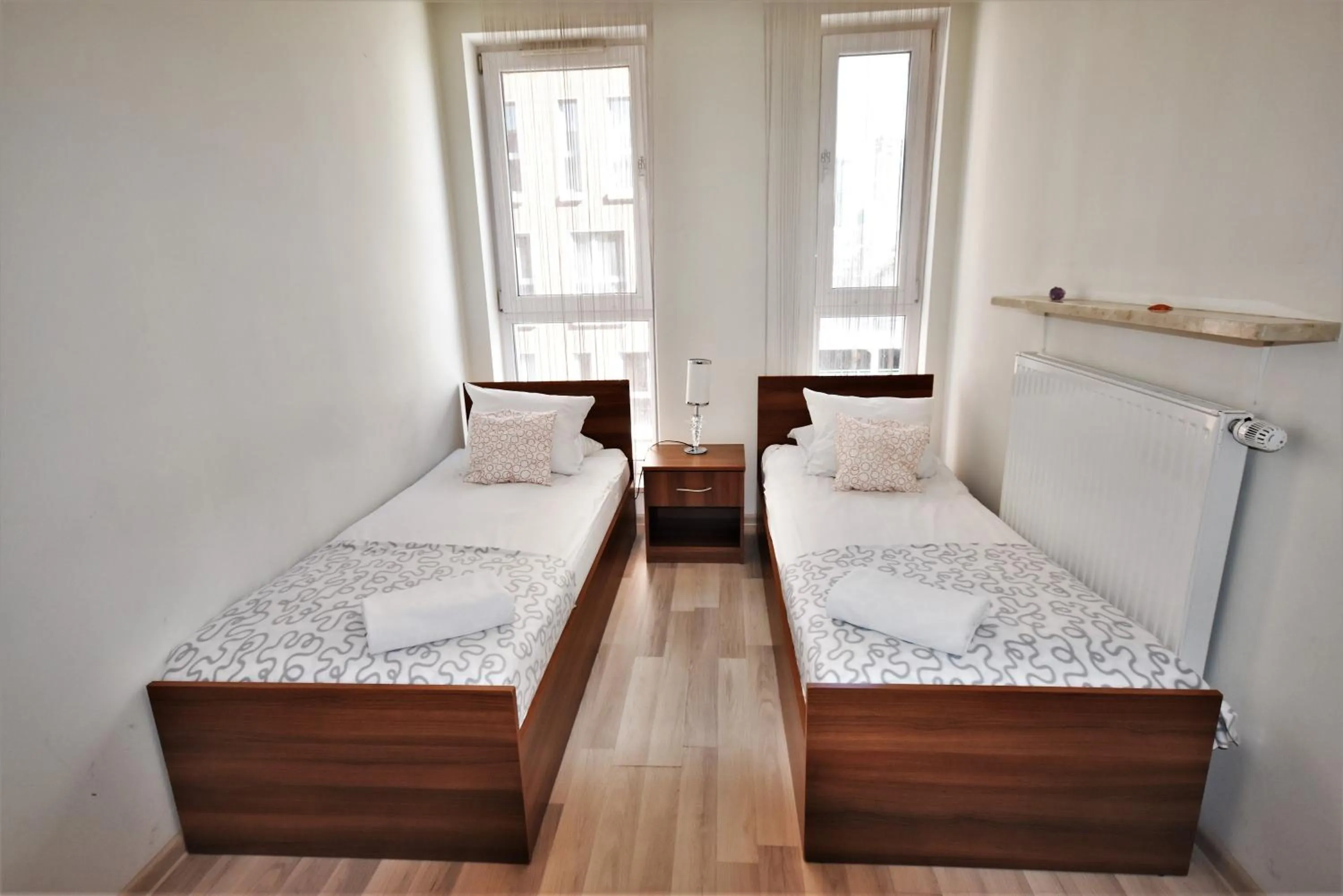 Bed in NotaBene Wola Apartment