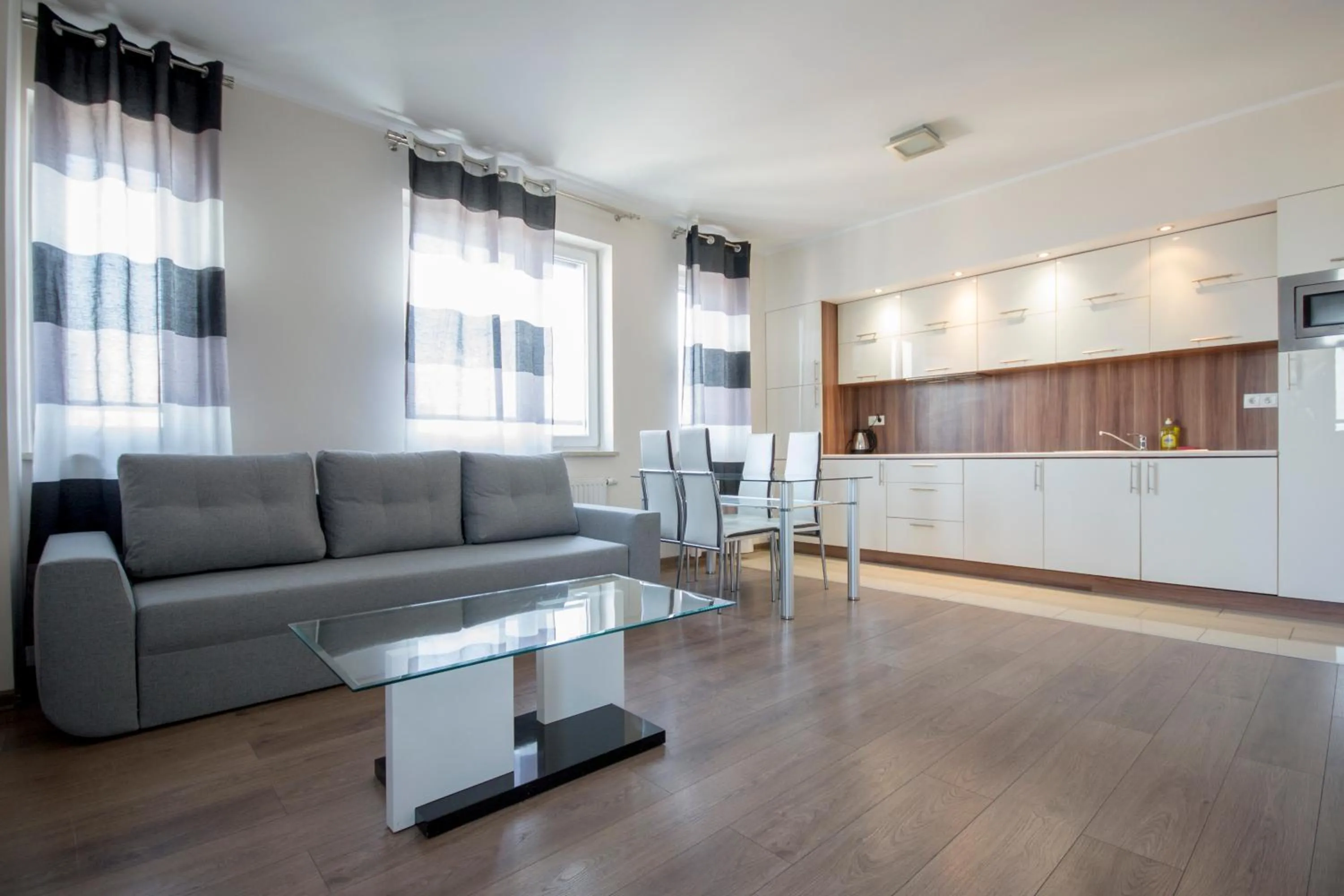 Living room in NotaBene Wola Apartment