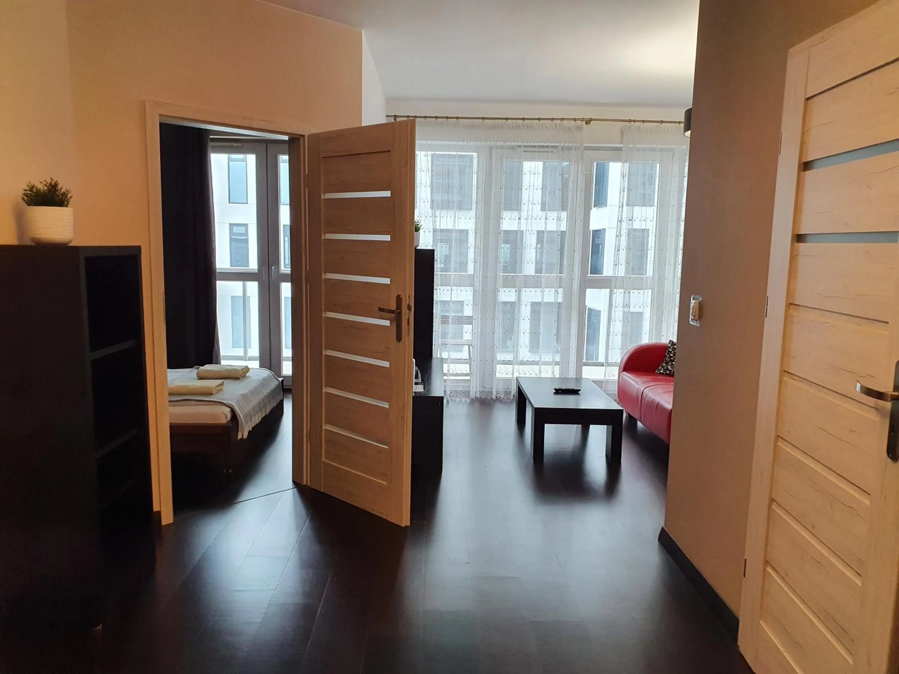 Photo of the whole room, Bed in NotaBene Wola Apartment